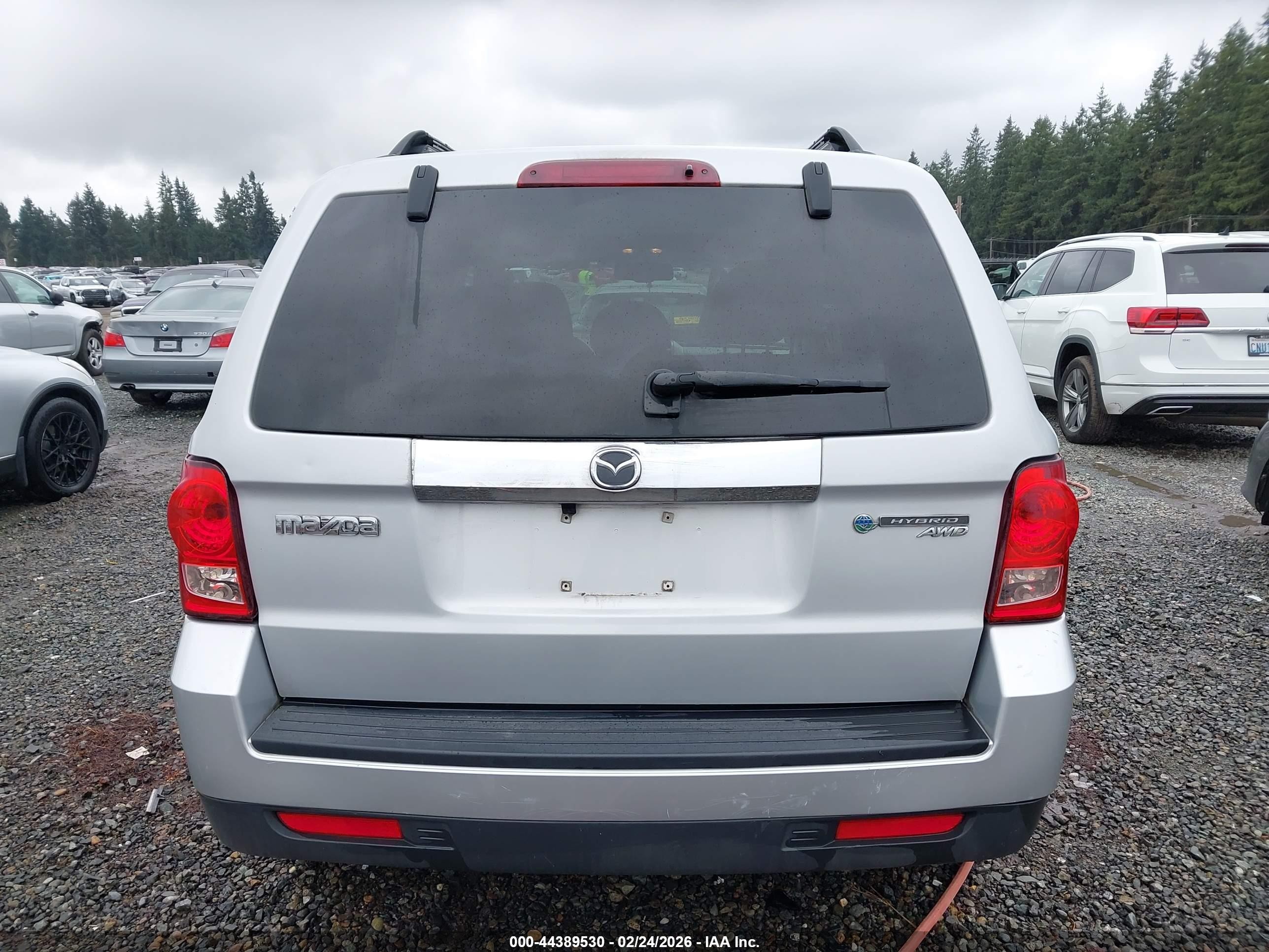2009 Mazda Tribute Hybrid Grand Touring Silver vin: 4F2CZ59369KM00286