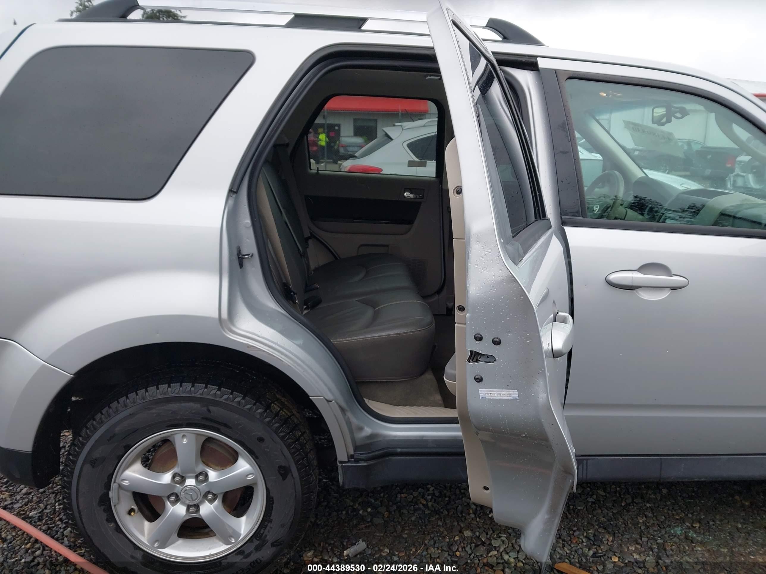 2009 Mazda Tribute Hybrid Grand Touring Silver vin: 4F2CZ59369KM00286