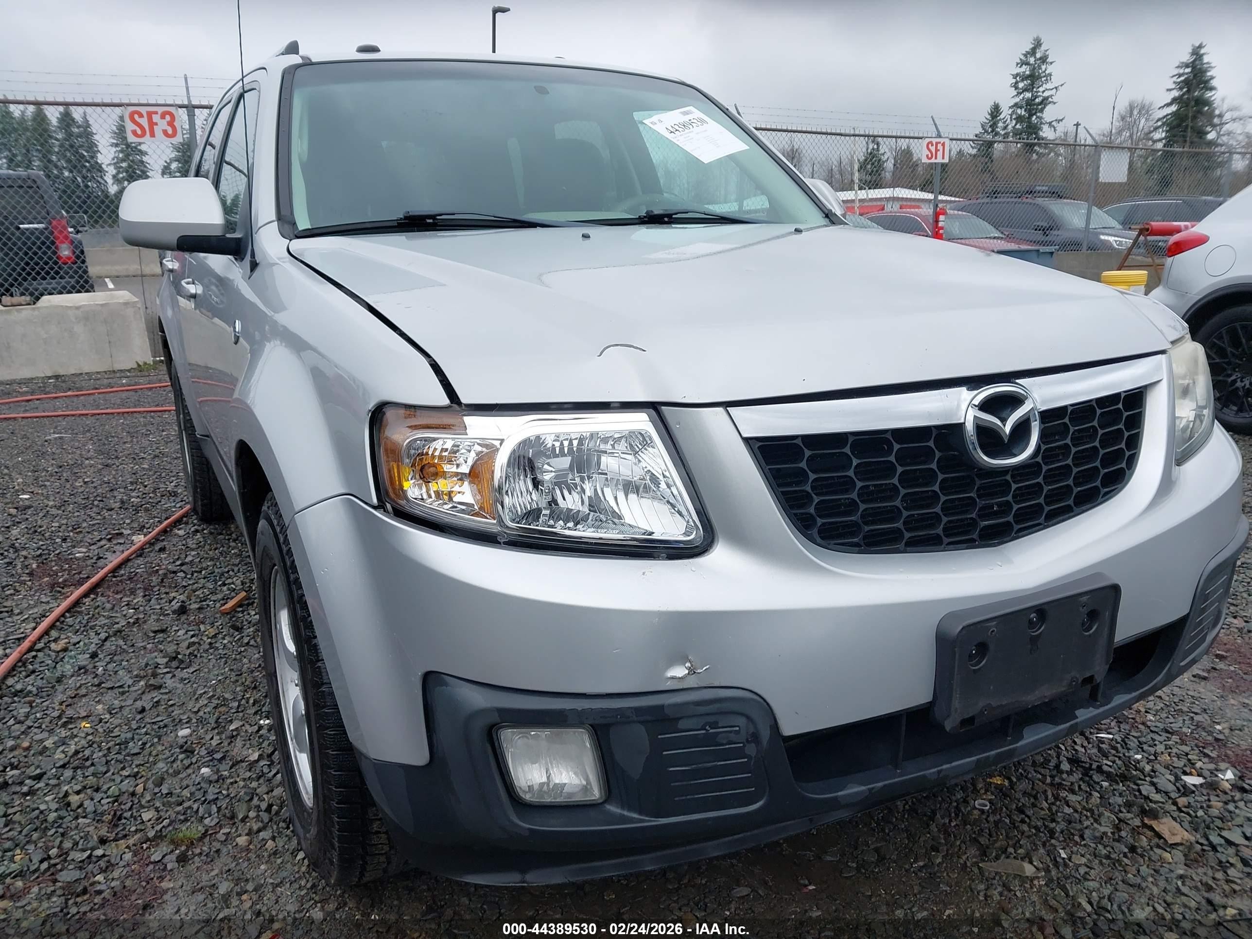 2009 Mazda Tribute Hybrid Grand Touring Silver vin: 4F2CZ59369KM00286