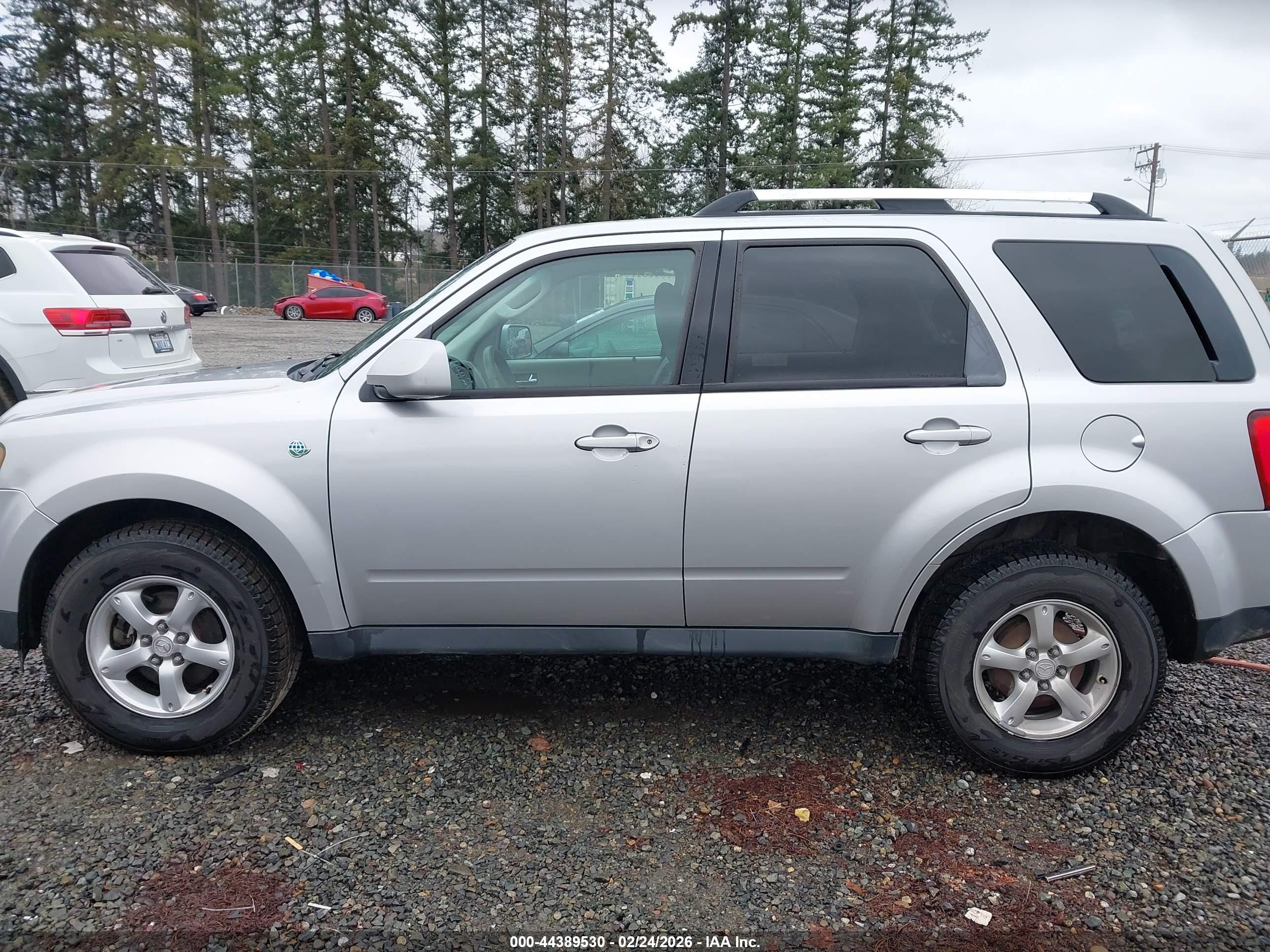 2009 Mazda Tribute Hybrid Grand Touring Silver vin: 4F2CZ59369KM00286