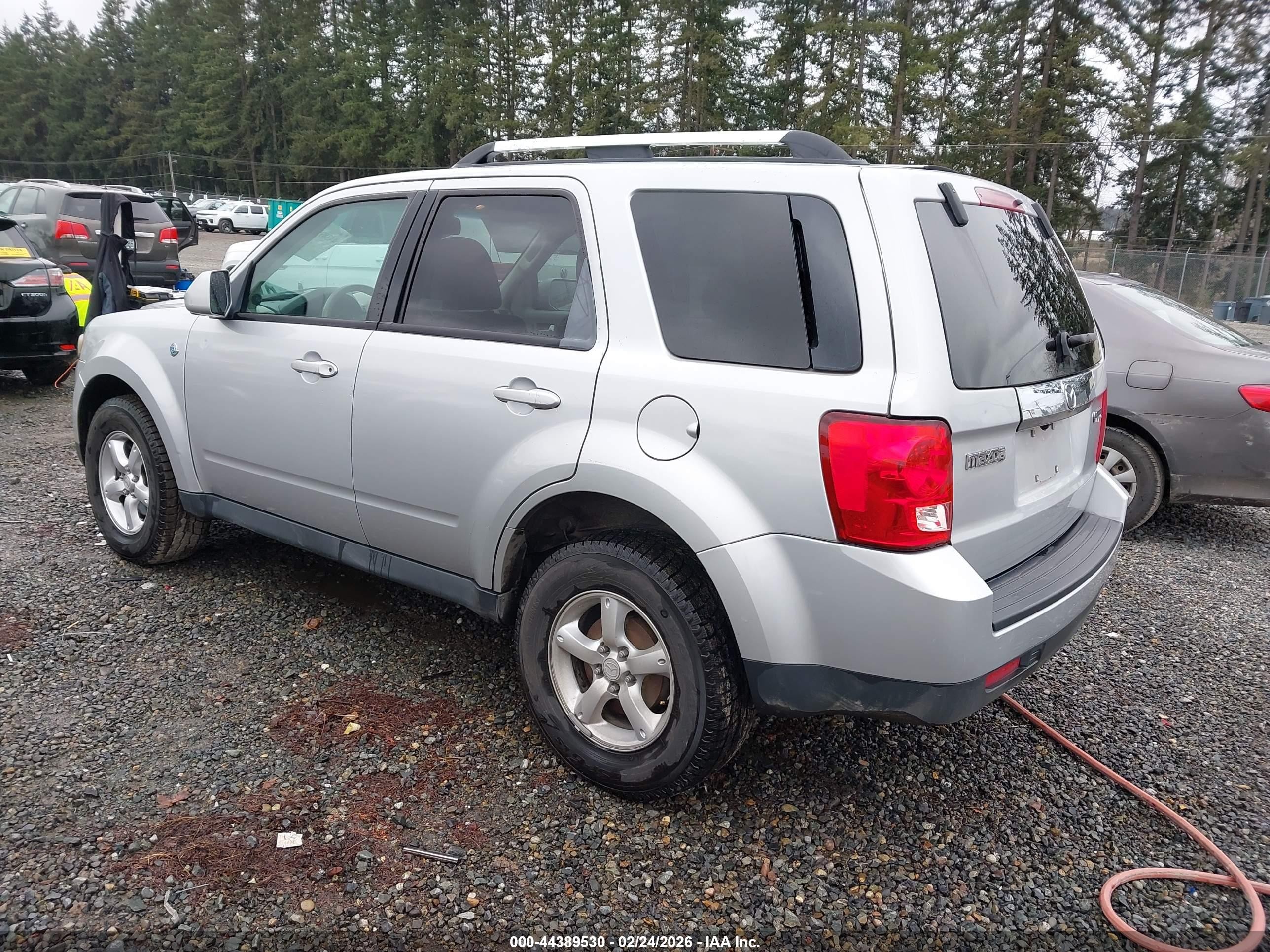 2009 Mazda Tribute Hybrid Grand Touring Silver vin: 4F2CZ59369KM00286