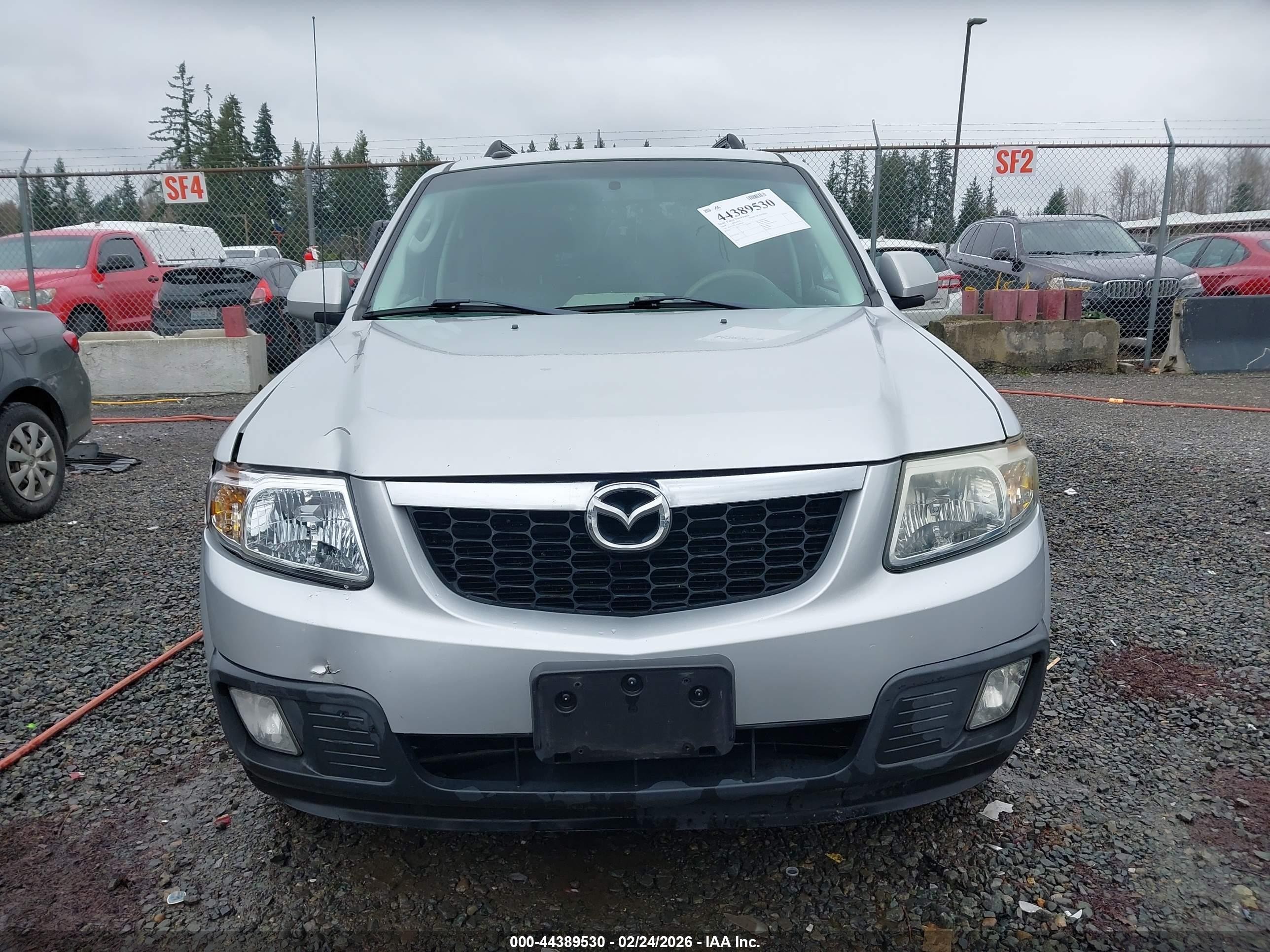 2009 Mazda Tribute Hybrid Grand Touring Silver vin: 4F2CZ59369KM00286