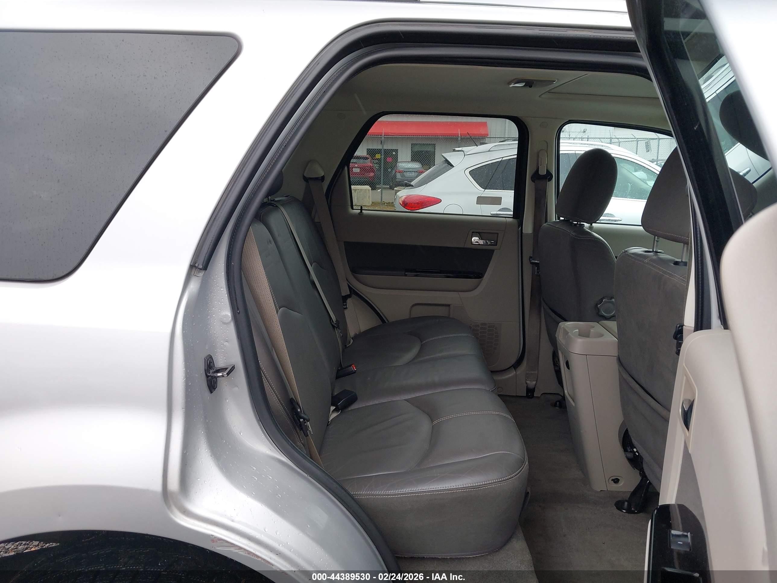 2009 Mazda Tribute Hybrid Grand Touring Silver vin: 4F2CZ59369KM00286