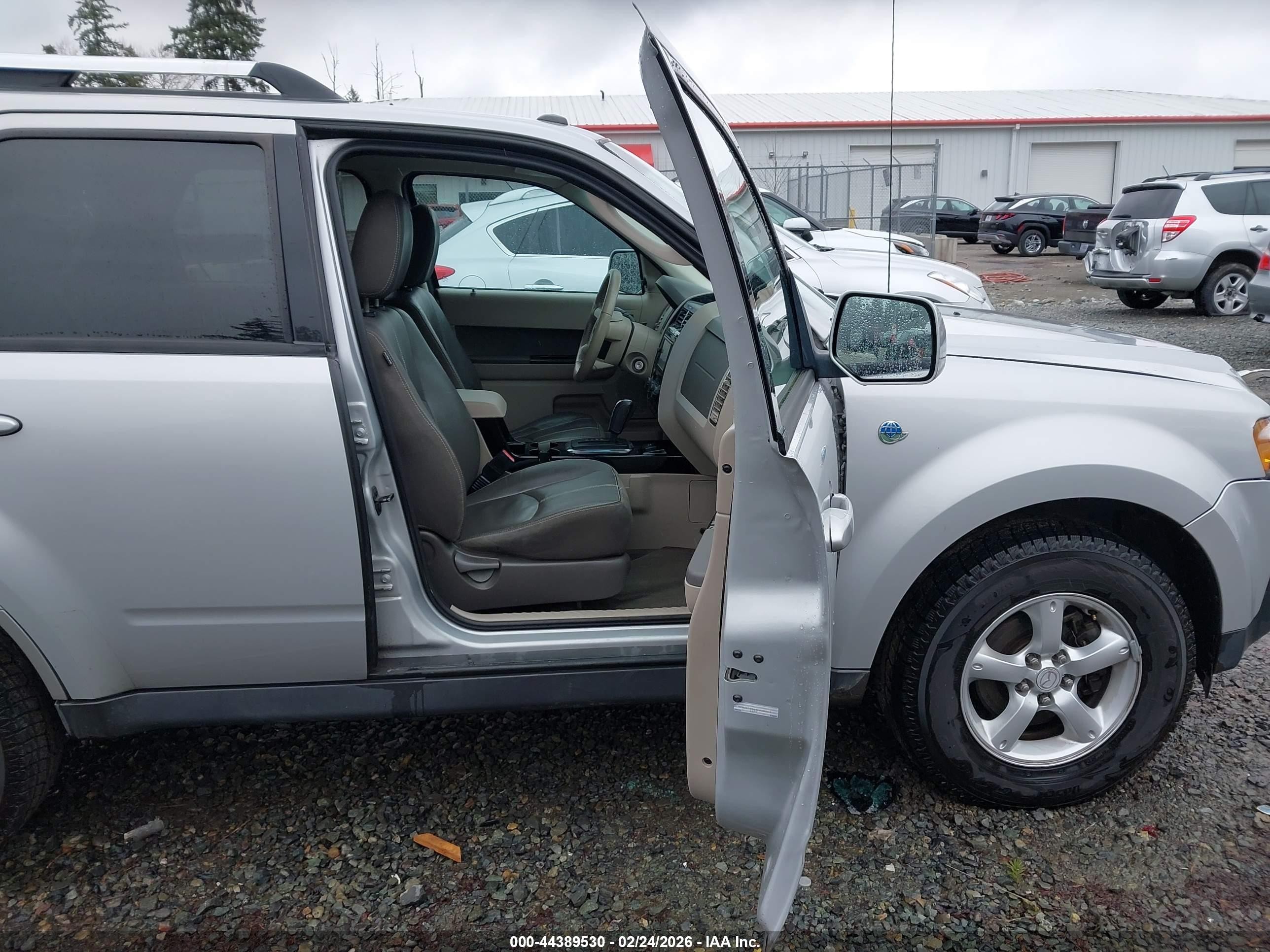 2009 Mazda Tribute Hybrid Grand Touring Silver vin: 4F2CZ59369KM00286