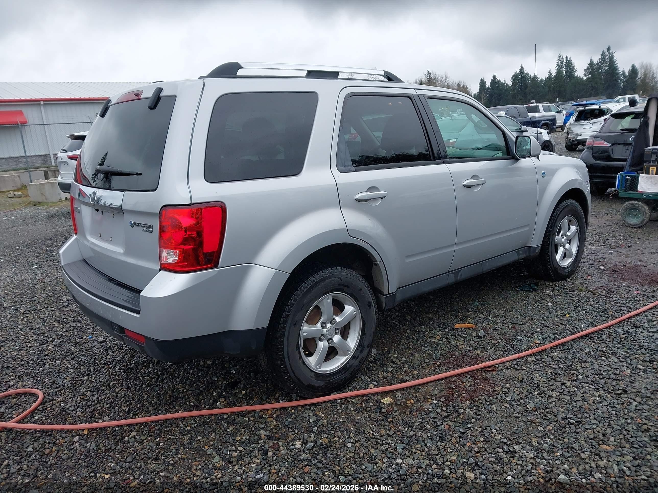 2009 Mazda Tribute Hybrid Grand Touring Silver vin: 4F2CZ59369KM00286