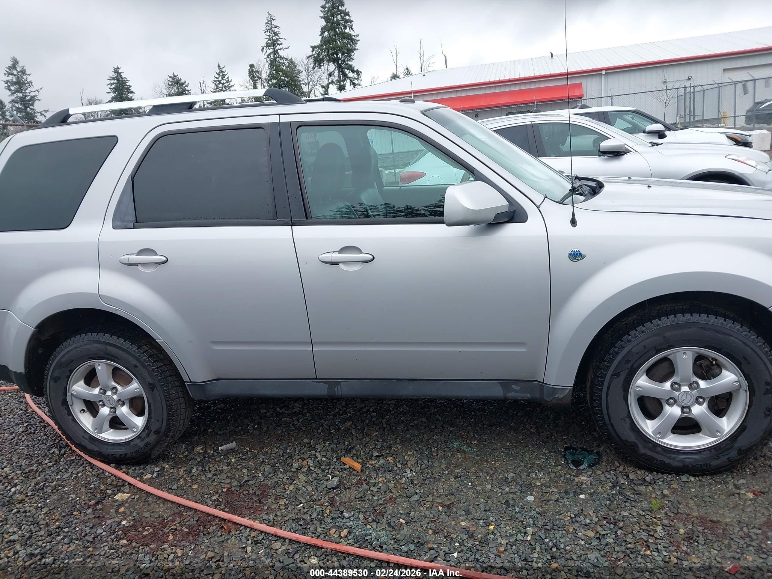 2009 Mazda Tribute Hybrid Grand Touring Silver vin: 4F2CZ59369KM00286