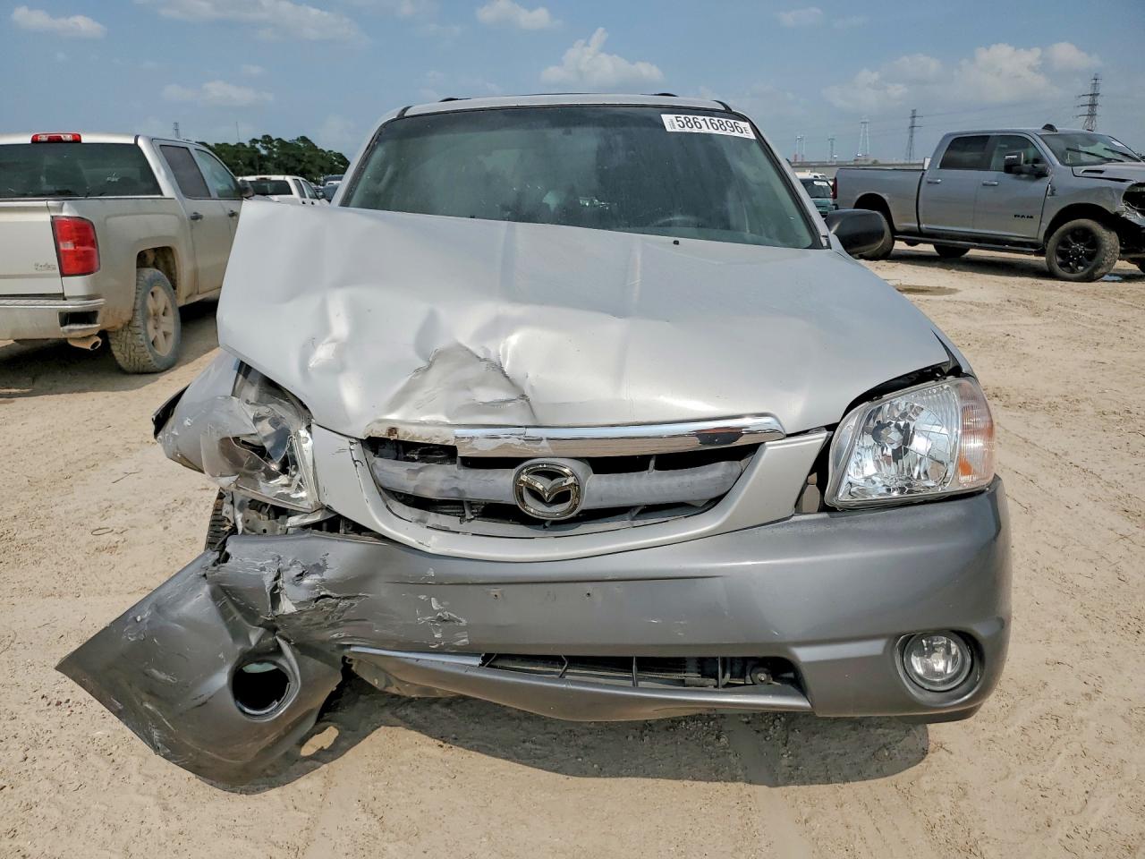 2002 Mazda Tribute Lx Silver vin: 4F2YU09112KM34583