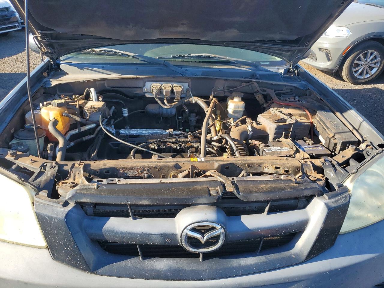 2006 Mazda Tribute I Black vin: 4F2YZ02Z46KM04470