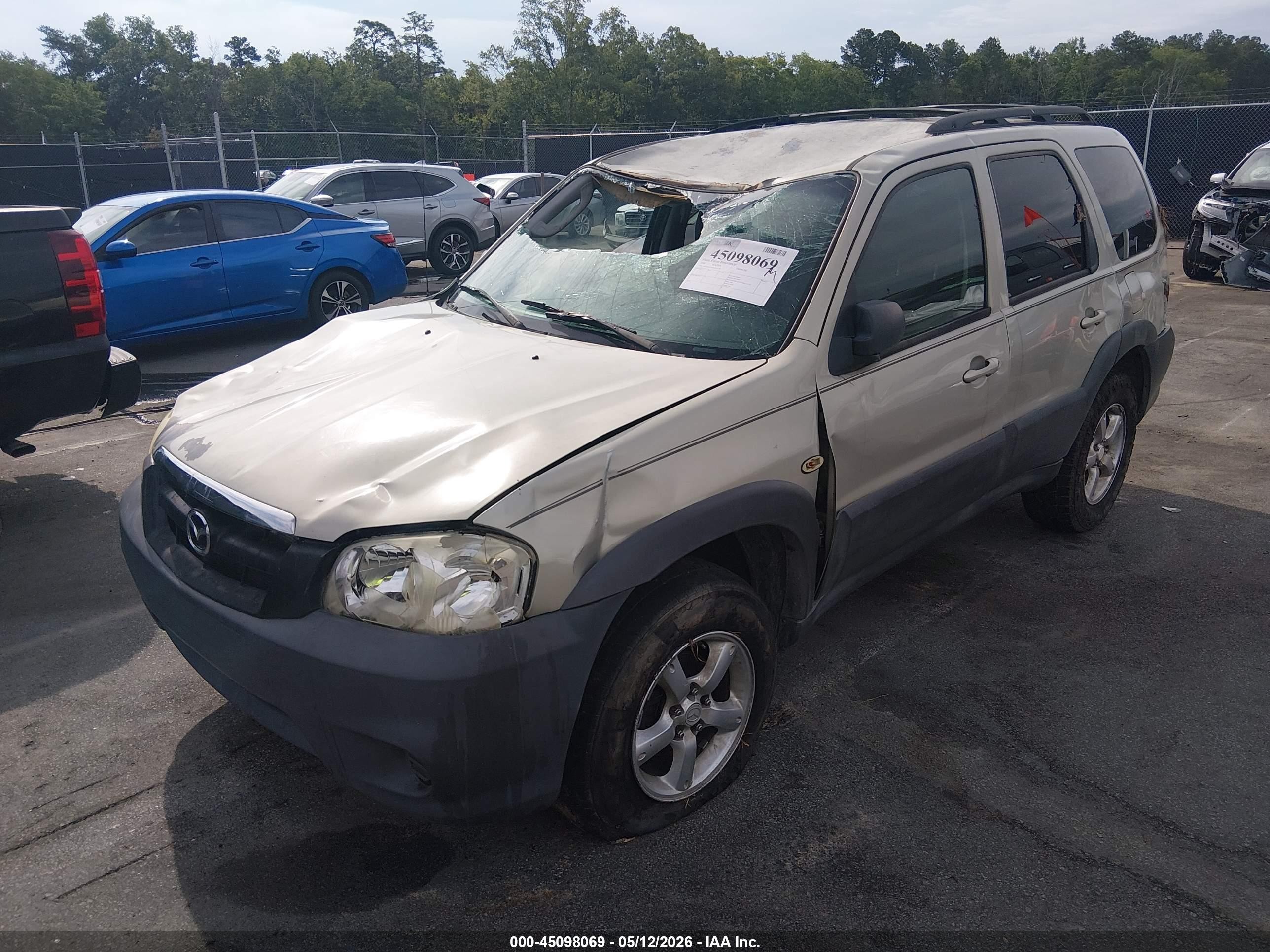2006 Mazda Tribute I Tan vin: 4F2YZ02Z56KM13159