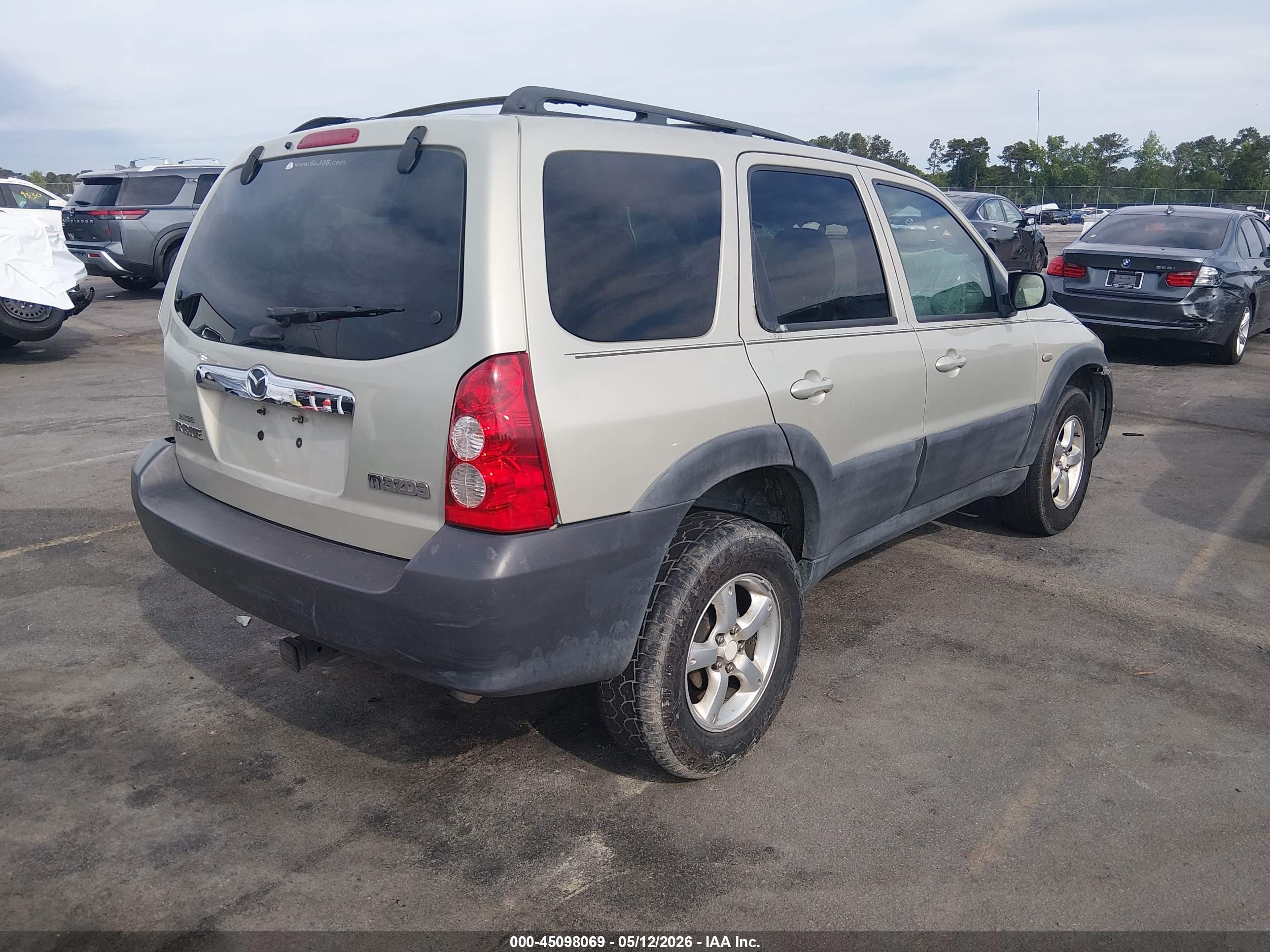 2006 Mazda Tribute I Tan vin: 4F2YZ02Z56KM13159