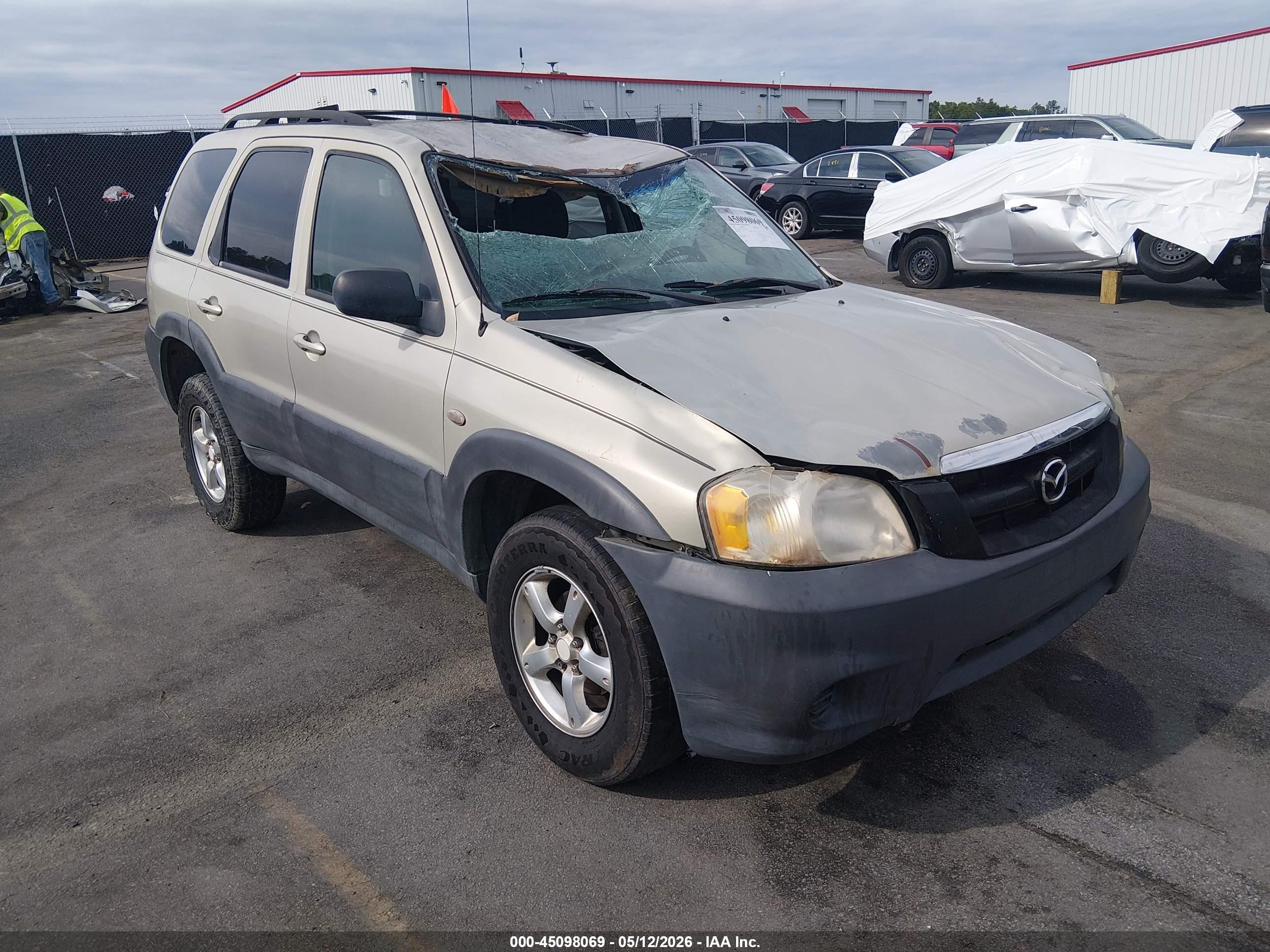 2006 Mazda Tribute I Tan vin: 4F2YZ02Z56KM13159