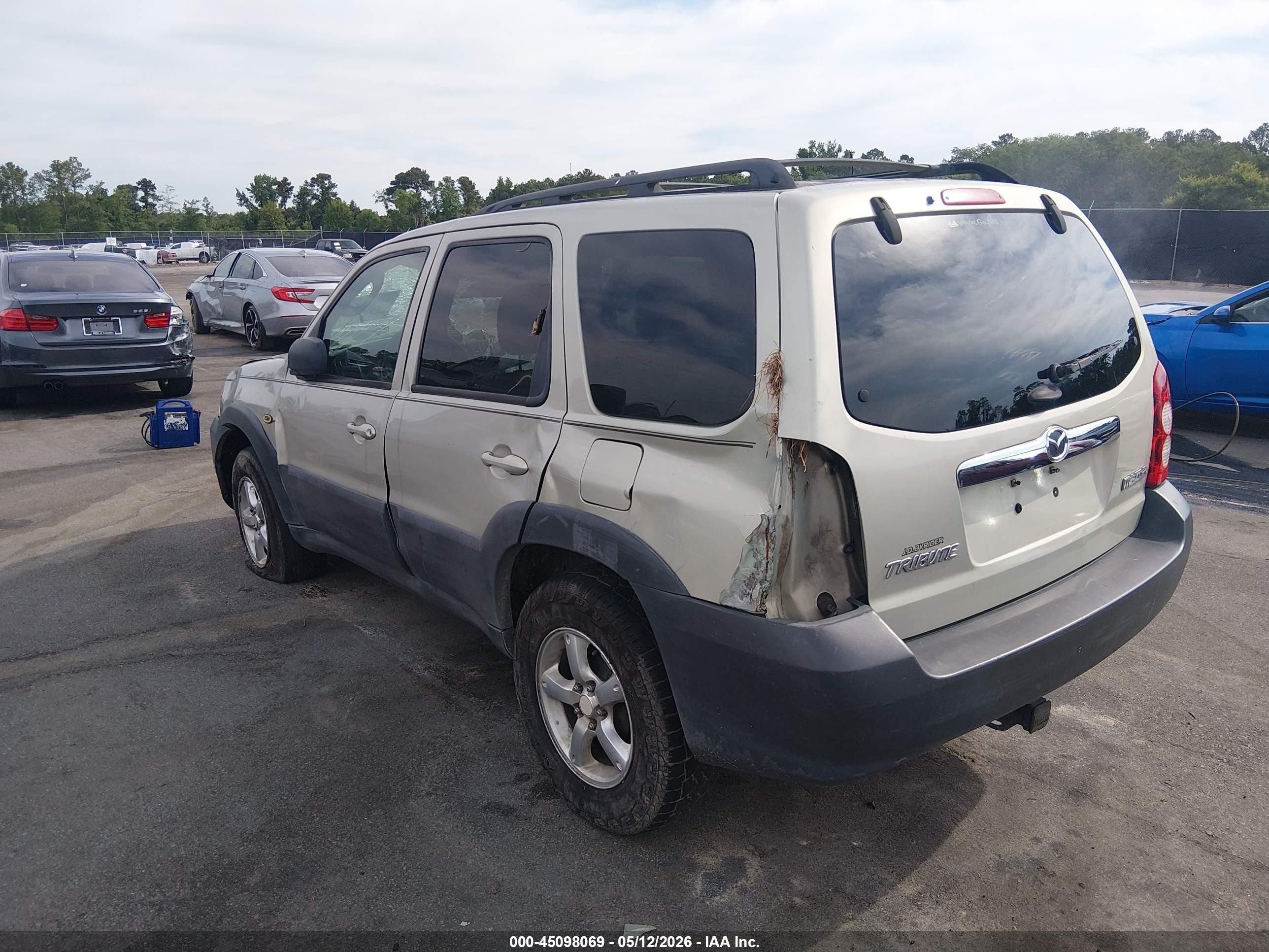 2006 Mazda Tribute I Tan vin: 4F2YZ02Z56KM13159