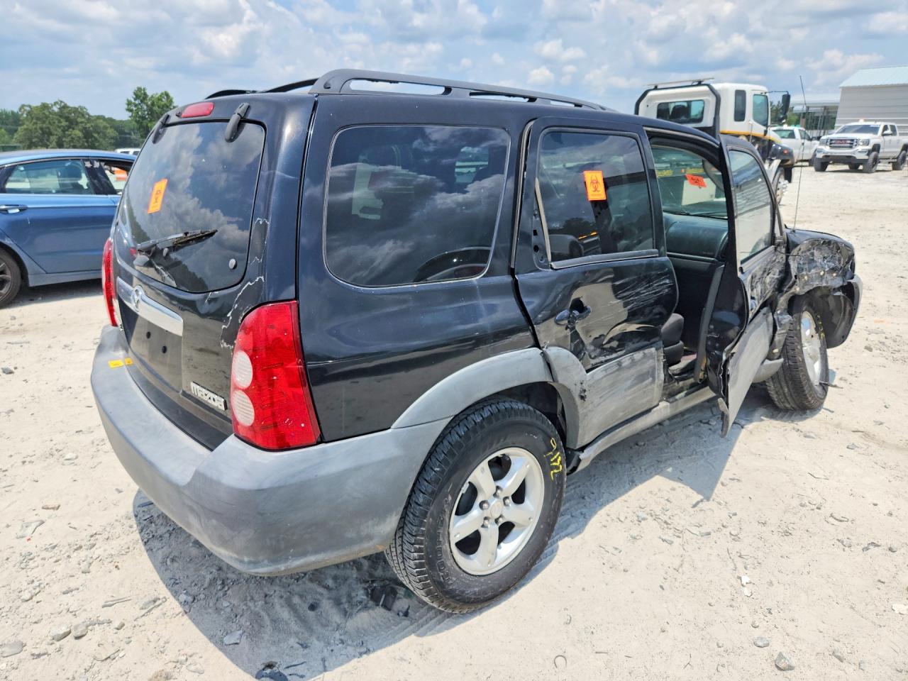 2006 Mazda Tribute I Black vin: 4F2YZ02Z66KM07273