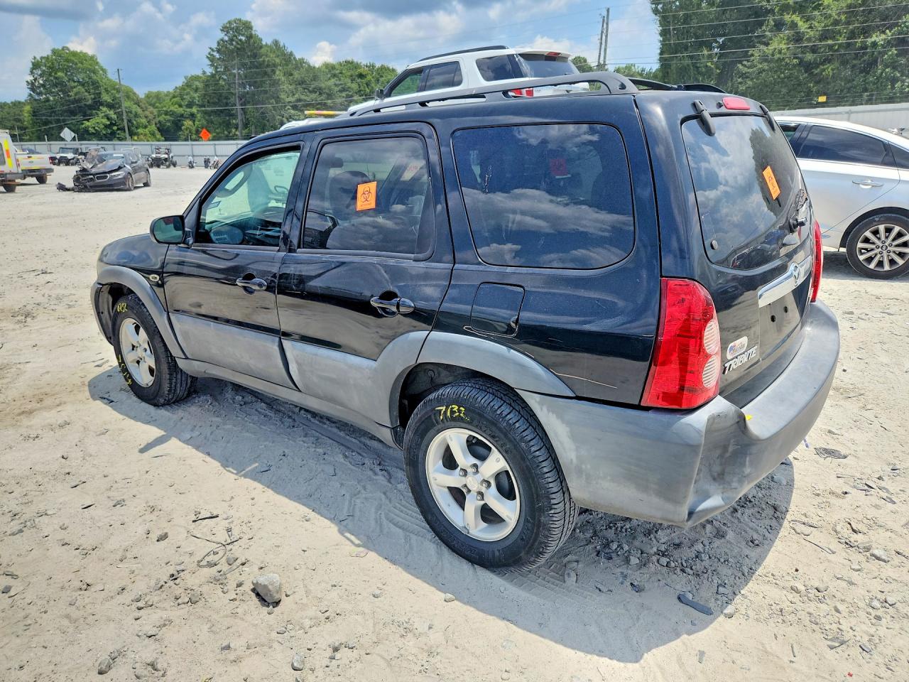 2006 Mazda Tribute I Black vin: 4F2YZ02Z66KM07273