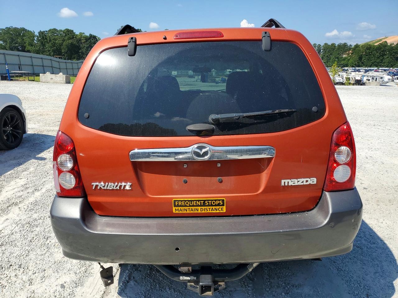 2005 Mazda Tribute S Оранжевый vin: 4F2YZ04185KM31919