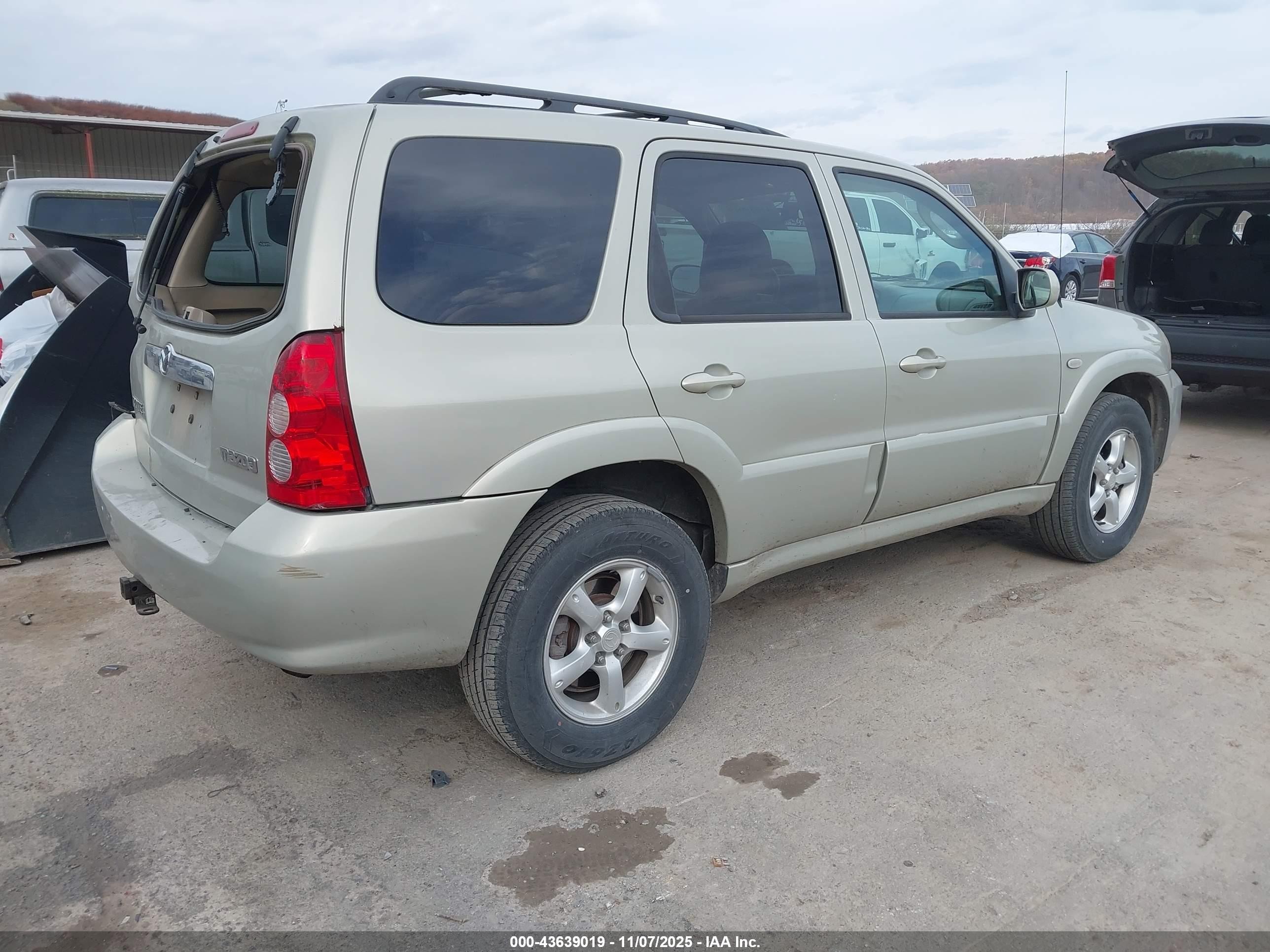 2005 Mazda Tribute S Tan vin: 4F2YZ96175KM40015