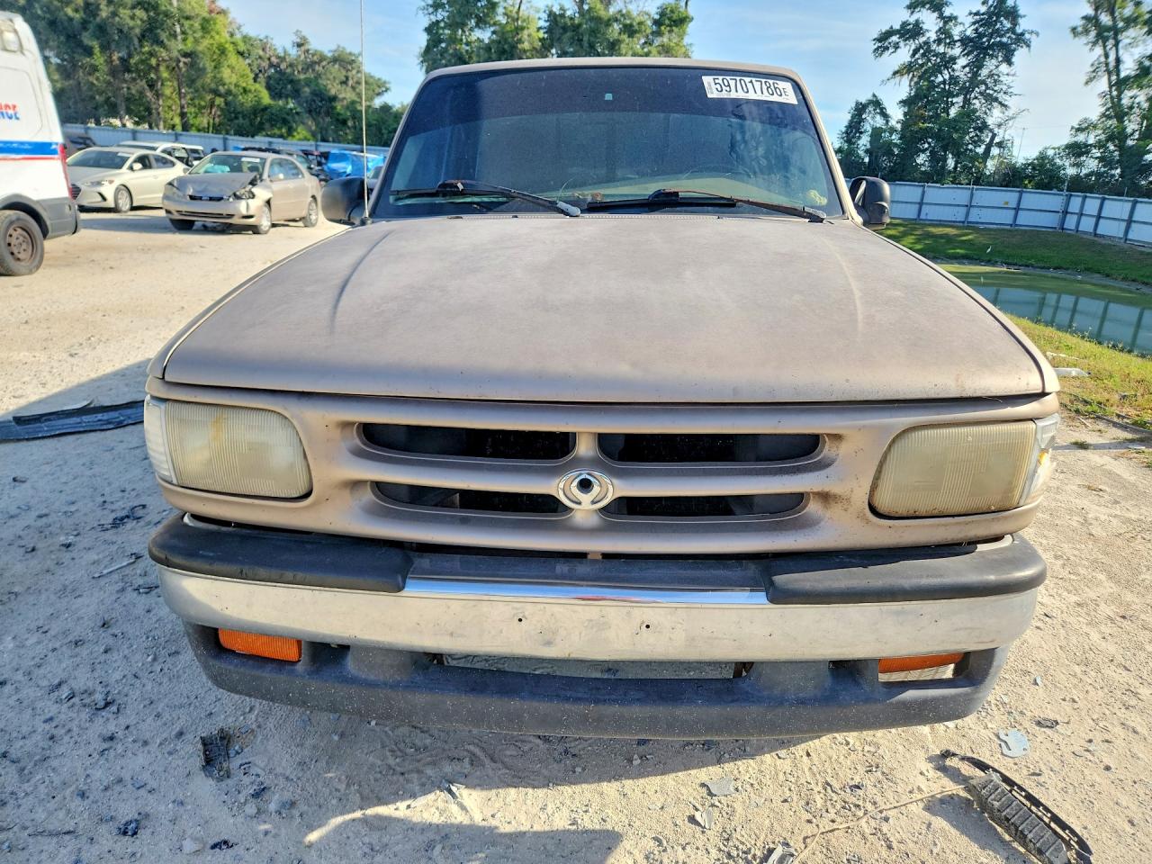 1997 Mazda B2300 Tan vin: 4F4CR12A0VTM03911