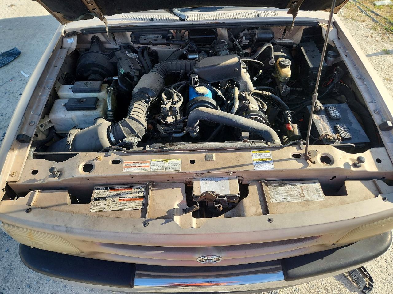 1997 Mazda B2300 Tan vin: 4F4CR12A0VTM03911