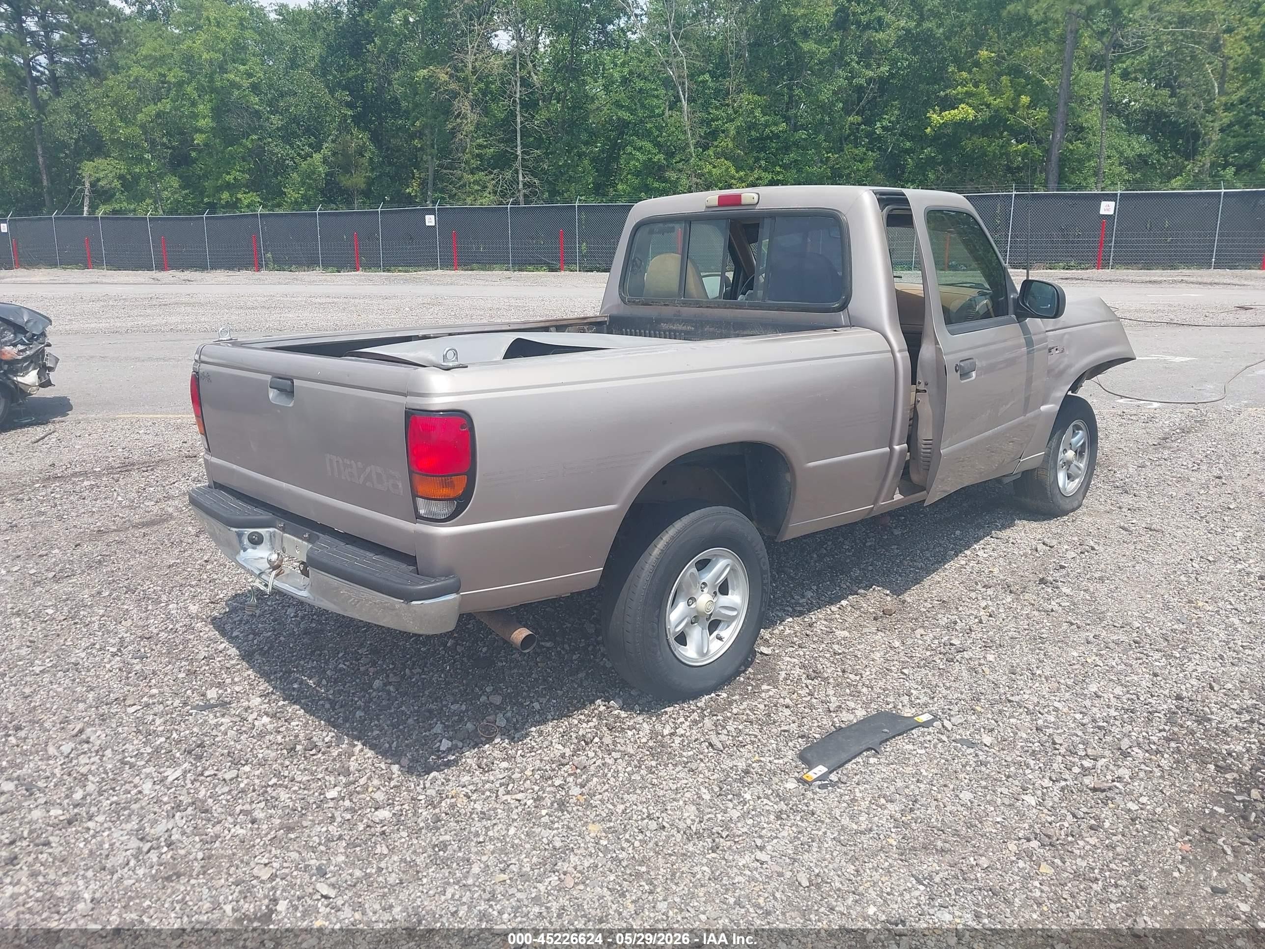 1996 Mazda B2300   Tan vin: 4F4CR12A9TTM08585
