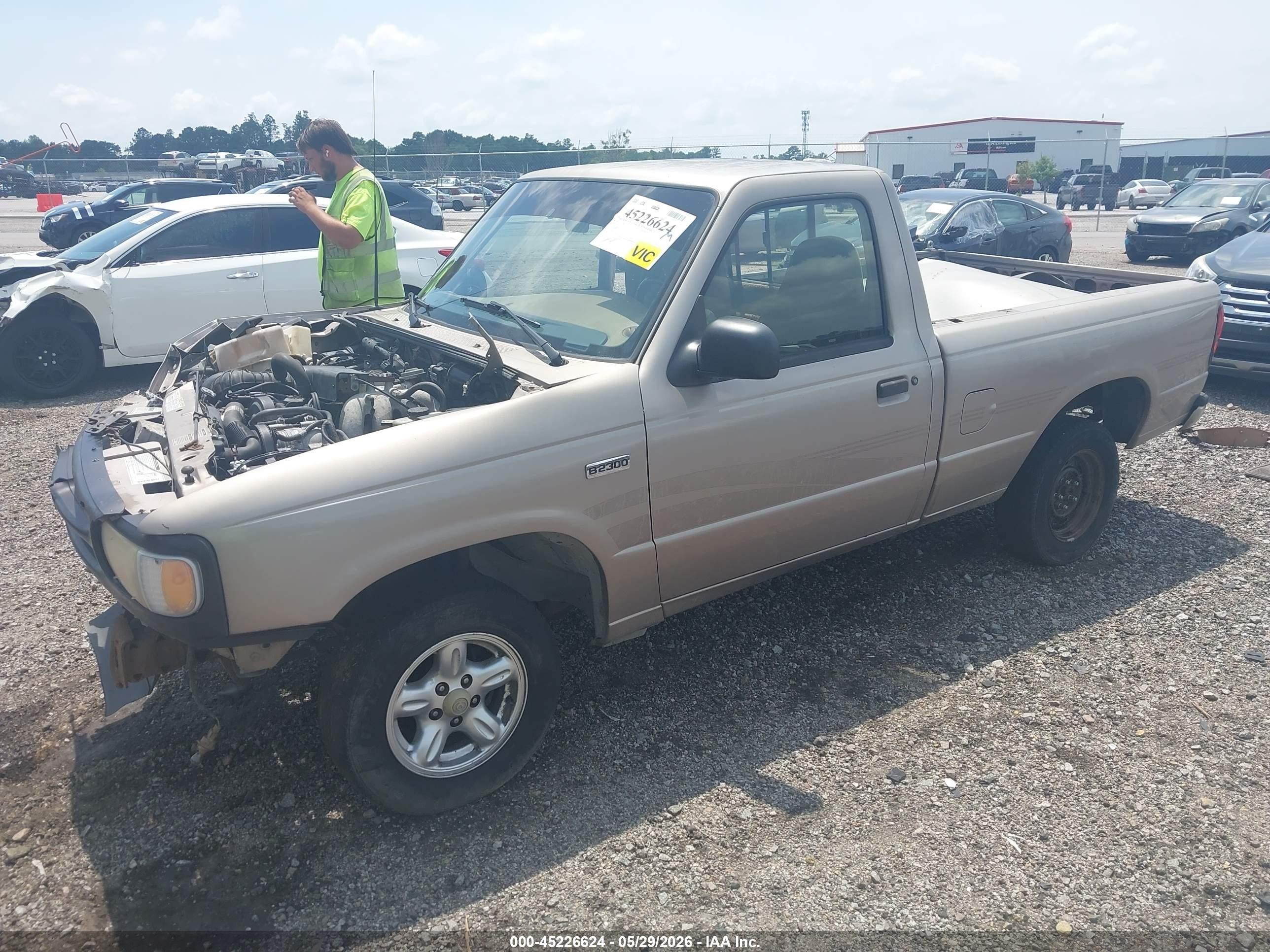 1996 Mazda B2300   Tan vin: 4F4CR12A9TTM08585
