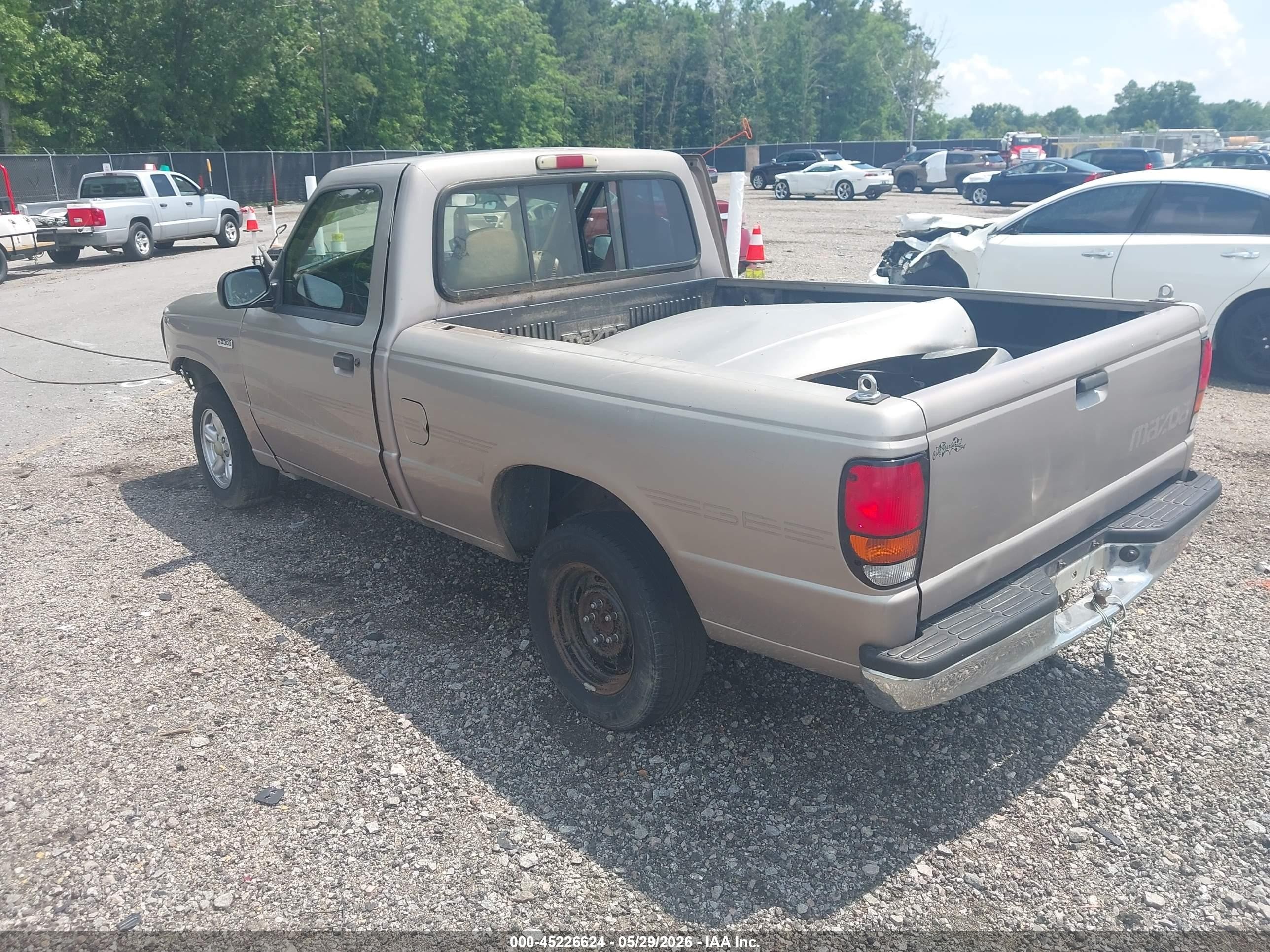 1996 Mazda B2300   Tan vin: 4F4CR12A9TTM08585