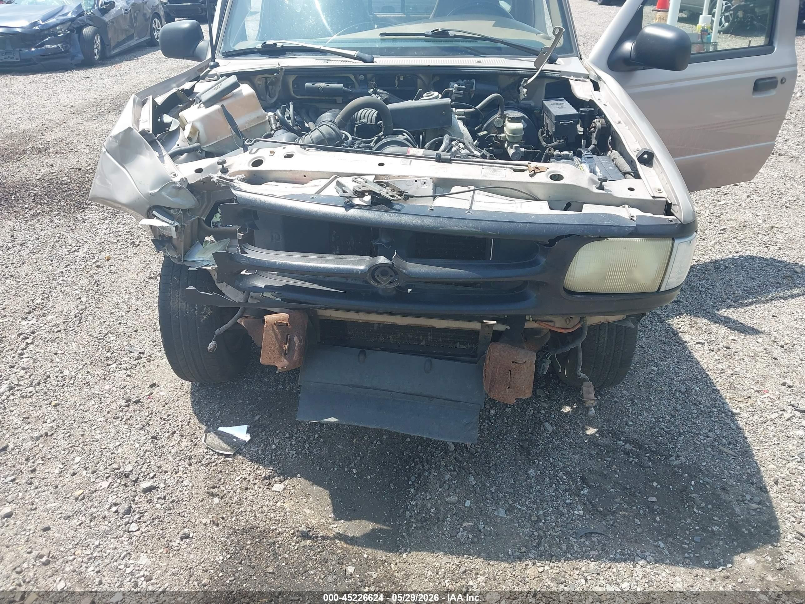 1996 Mazda B2300   Tan vin: 4F4CR12A9TTM08585