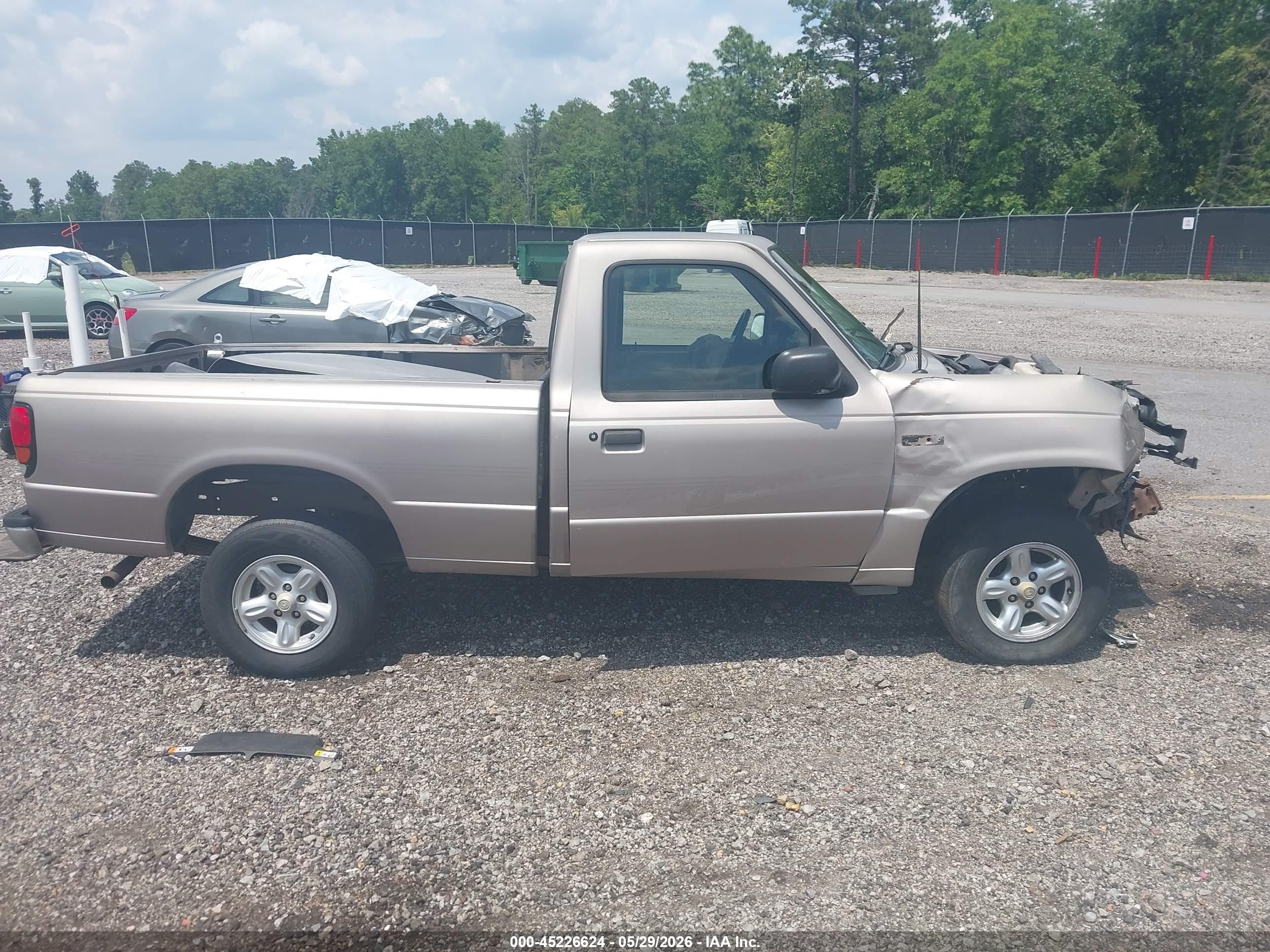 1996 Mazda B2300   Tan vin: 4F4CR12A9TTM08585