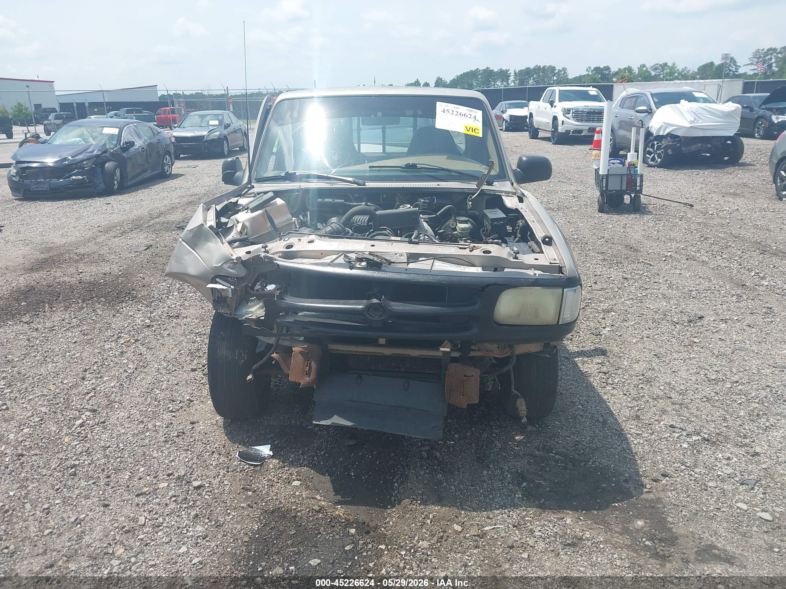1996 Mazda B2300   Tan vin: 4F4CR12A9TTM08585