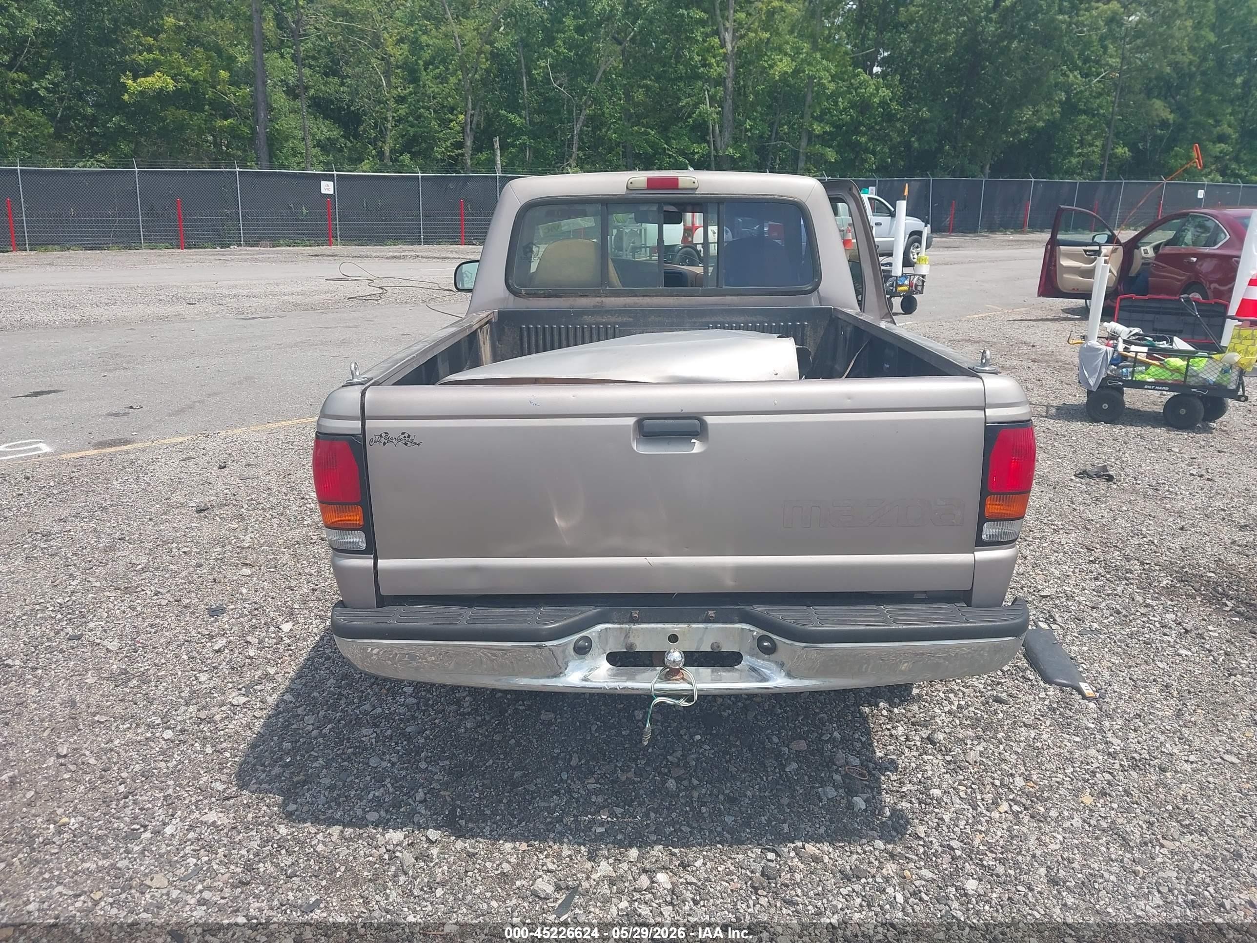 1996 Mazda B2300   Tan vin: 4F4CR12A9TTM08585