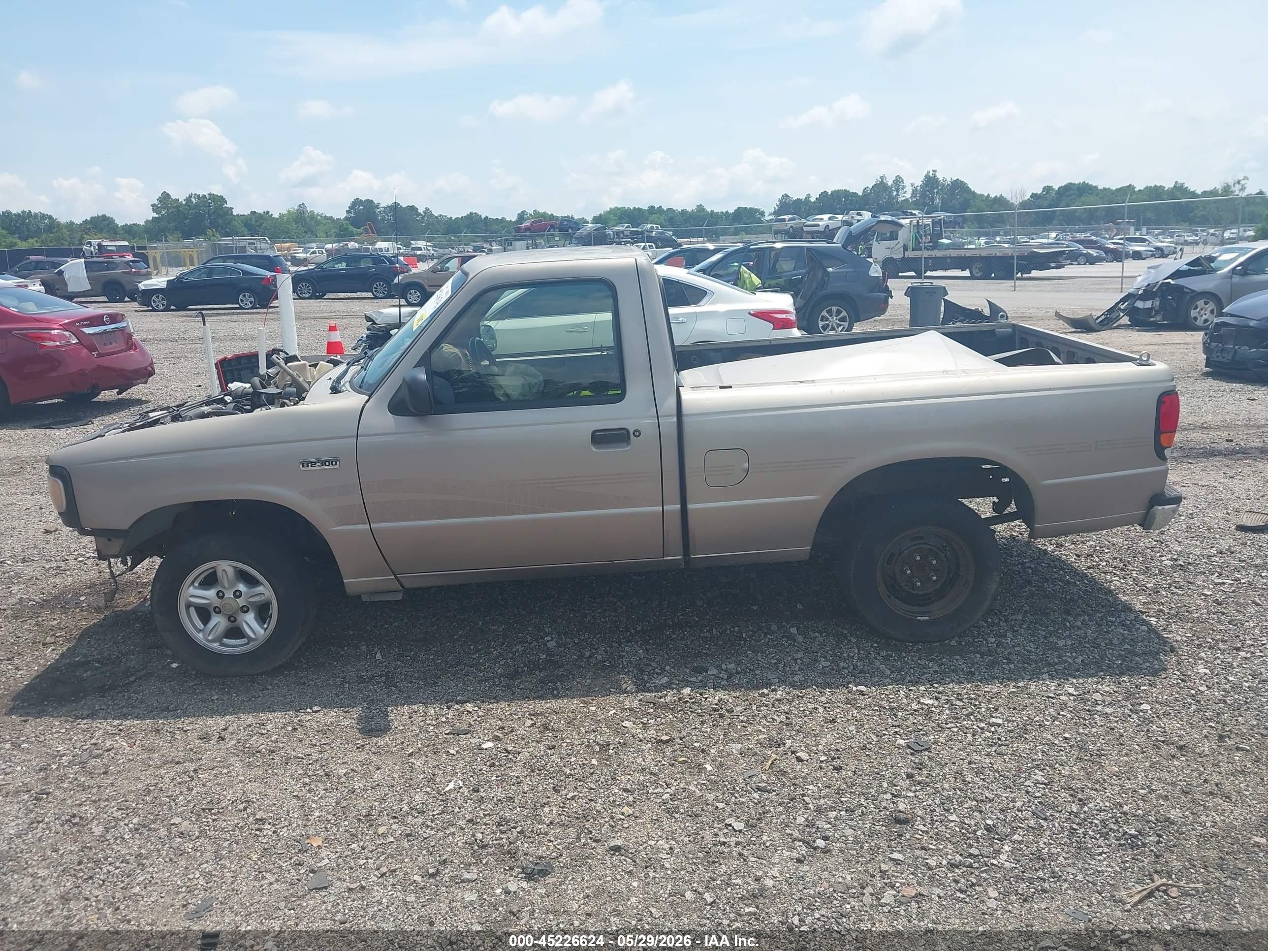 1996 Mazda B2300   Tan vin: 4F4CR12A9TTM08585