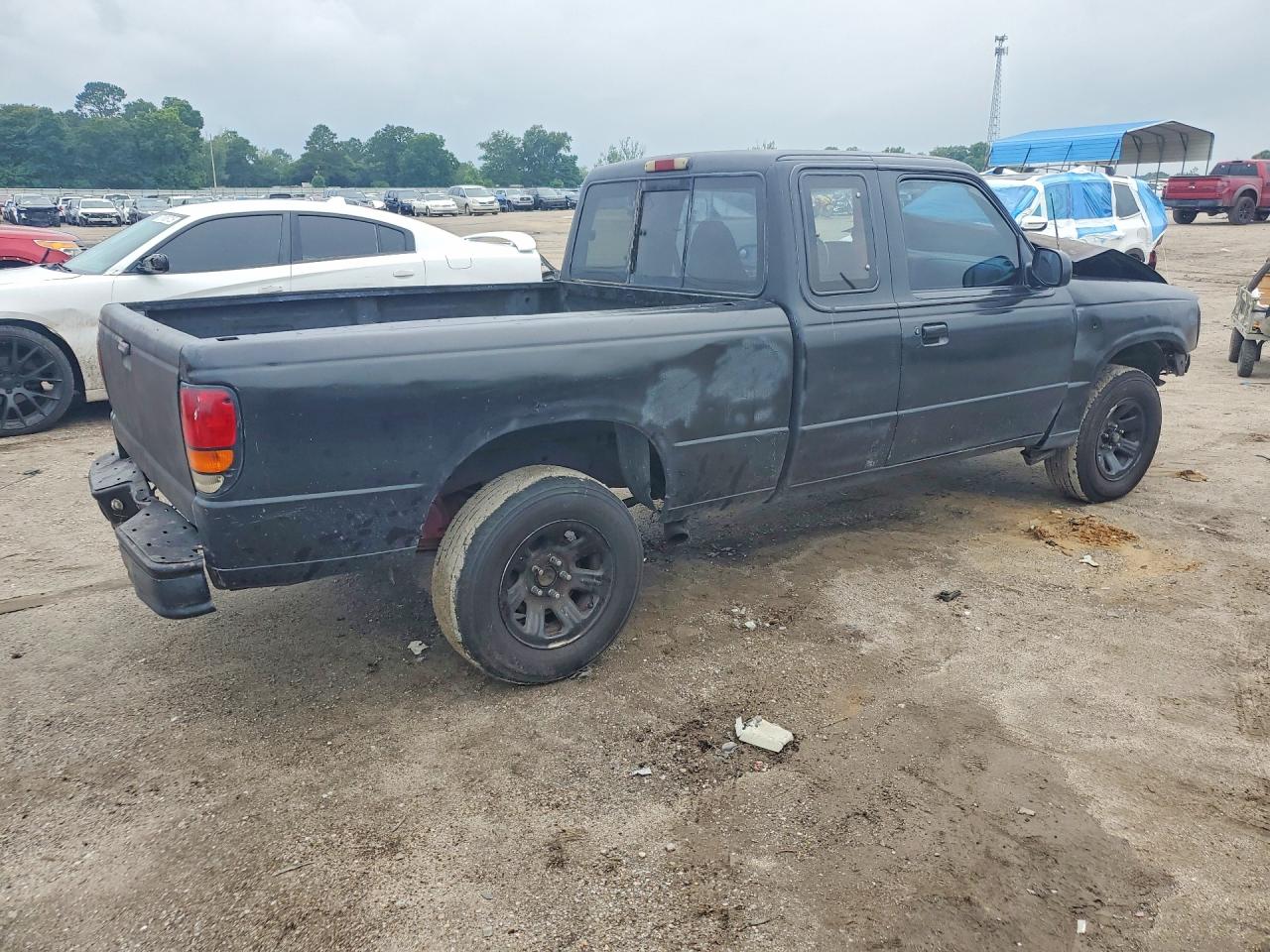1995 Mazda B2300 Cab Plus Black vin: 4F4CR16A3STM07599