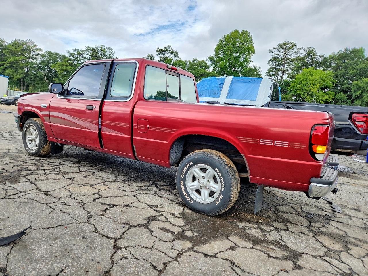 1997 Mazda B4000 Cab Plus Red vin: 4F4CR16X5VTM26910