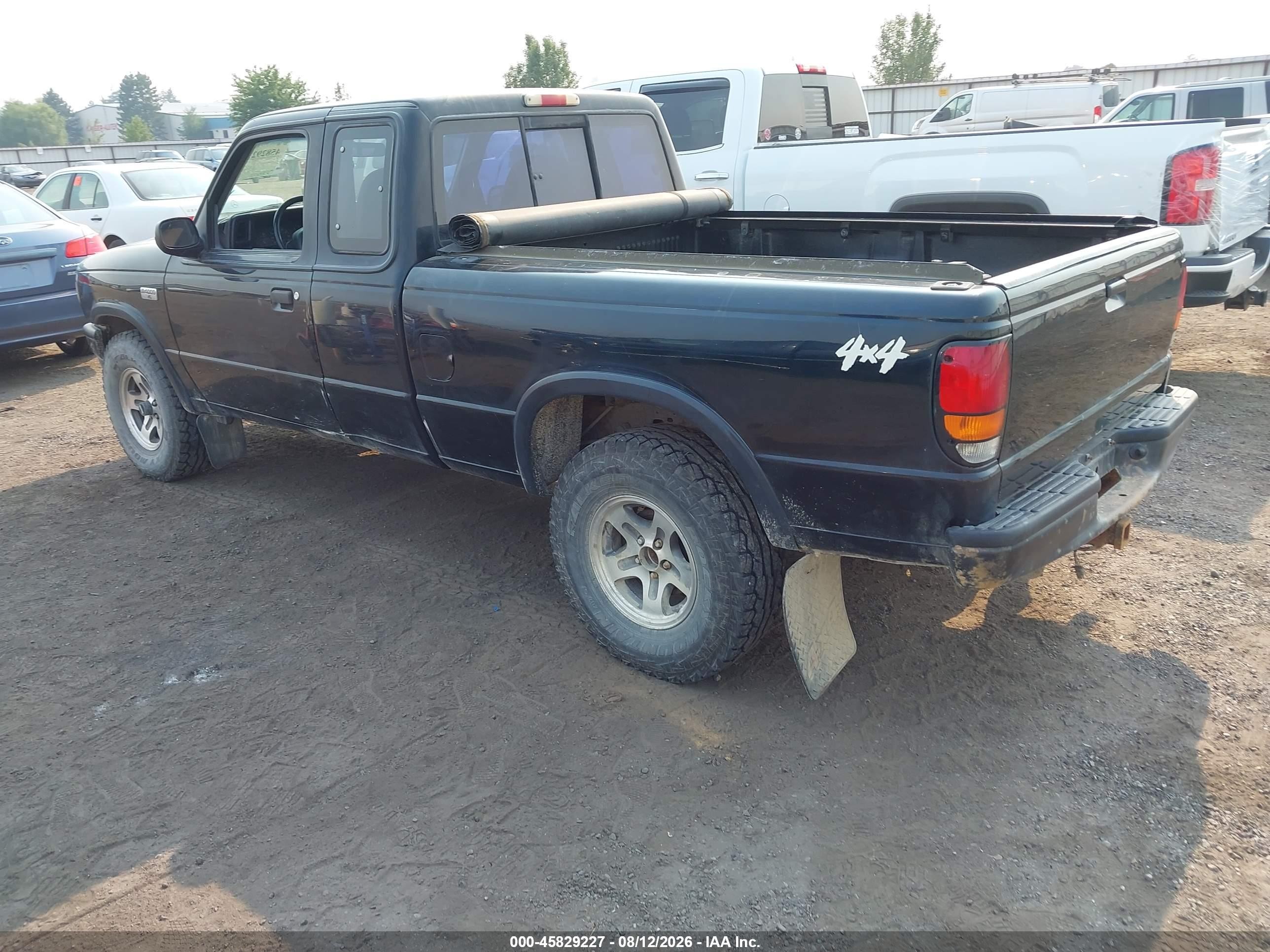 1994 Mazda B4000 Cab Plus Black vin: 4F4DR17X0RTM60620