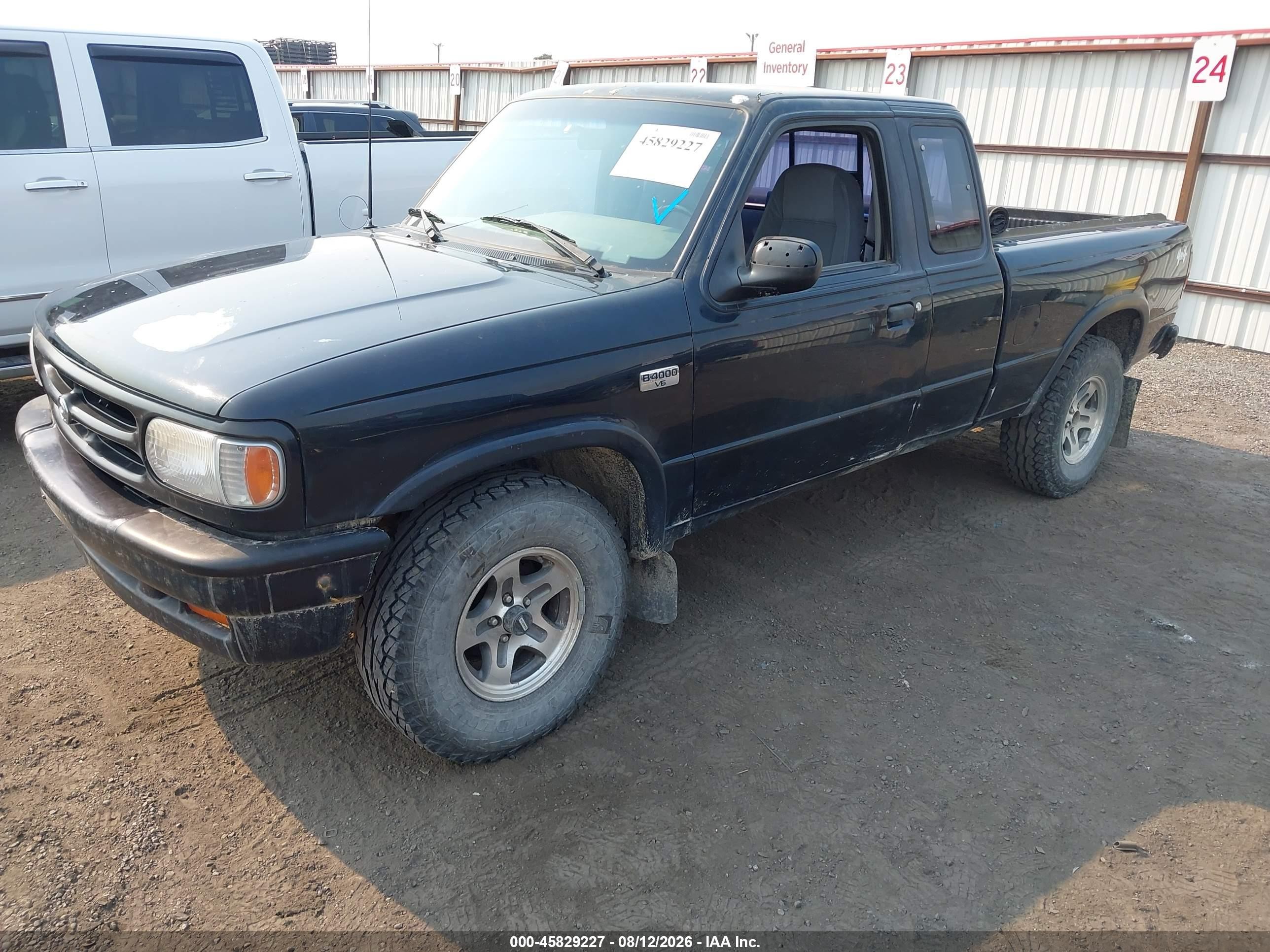 1994 Mazda B4000 Cab Plus Black vin: 4F4DR17X0RTM60620