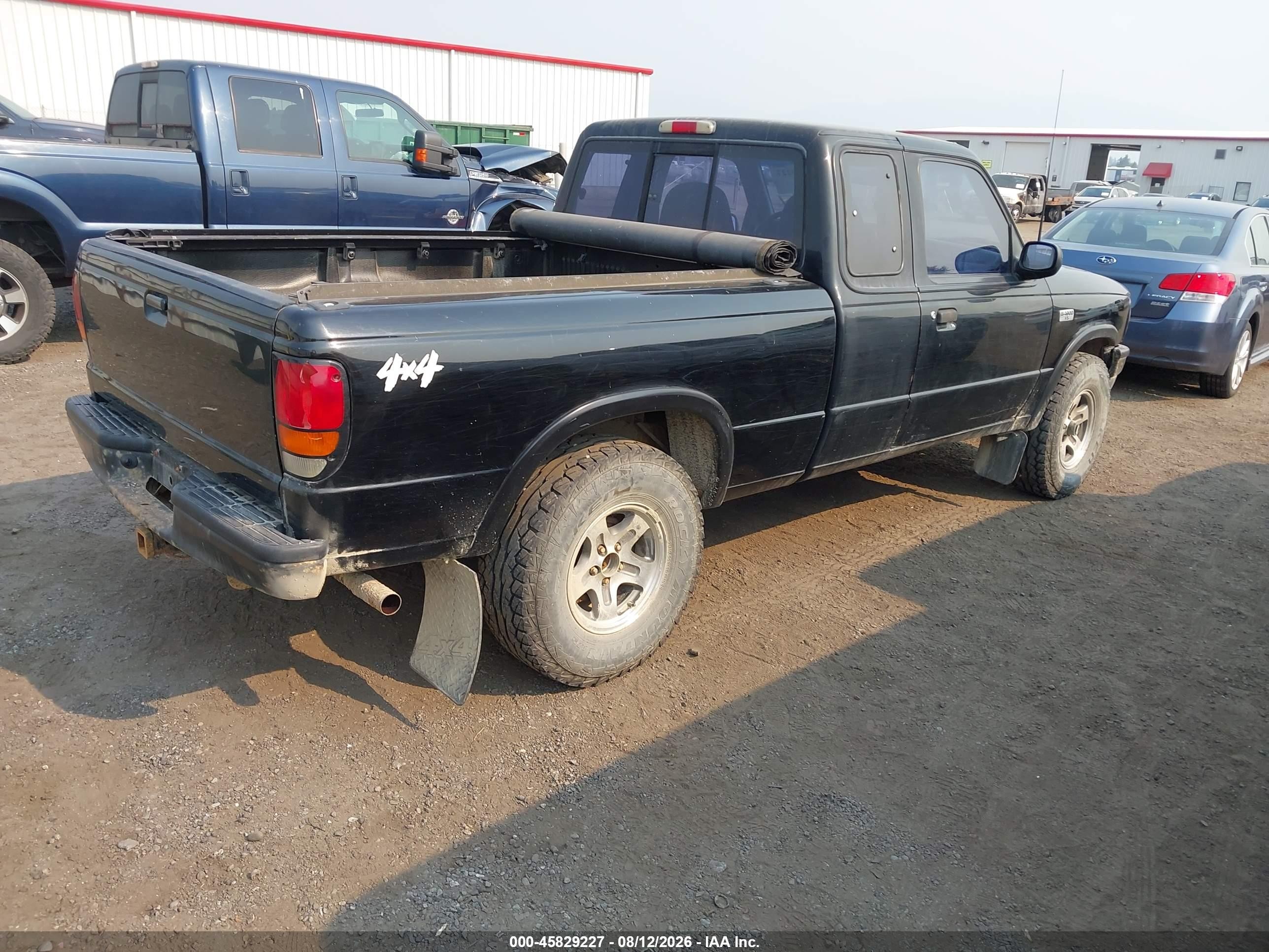 1994 Mazda B4000 Cab Plus Black vin: 4F4DR17X0RTM60620
