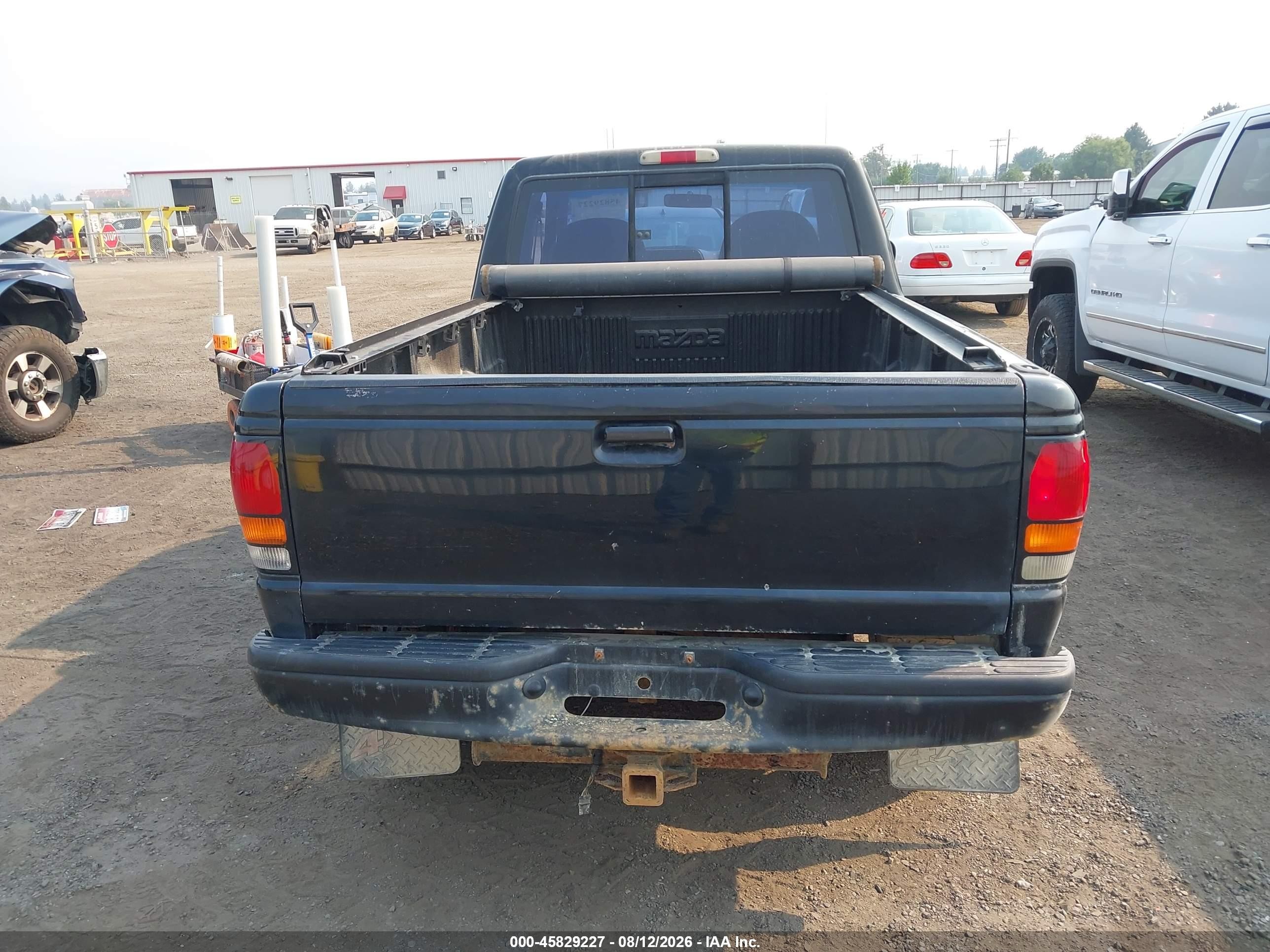 1994 Mazda B4000 Cab Plus Black vin: 4F4DR17X0RTM60620