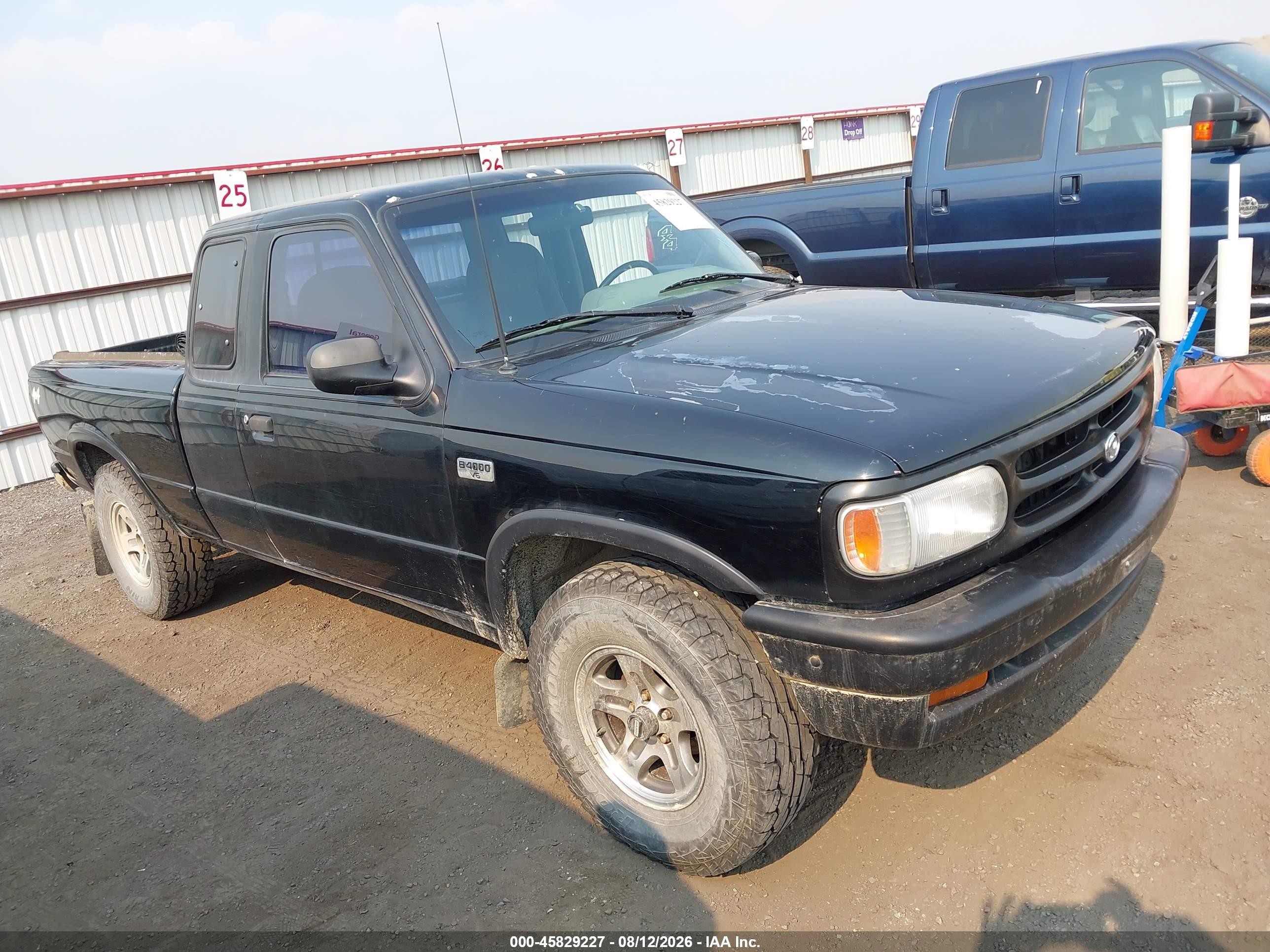 1994 Mazda B4000 Cab Plus Black vin: 4F4DR17X0RTM60620