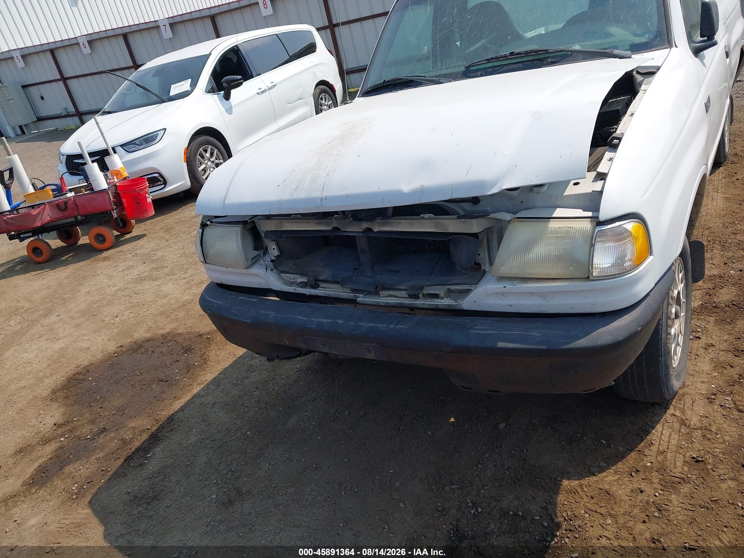 1999 Mazda B2500   White vin: 4F4YR12CXXTM26221