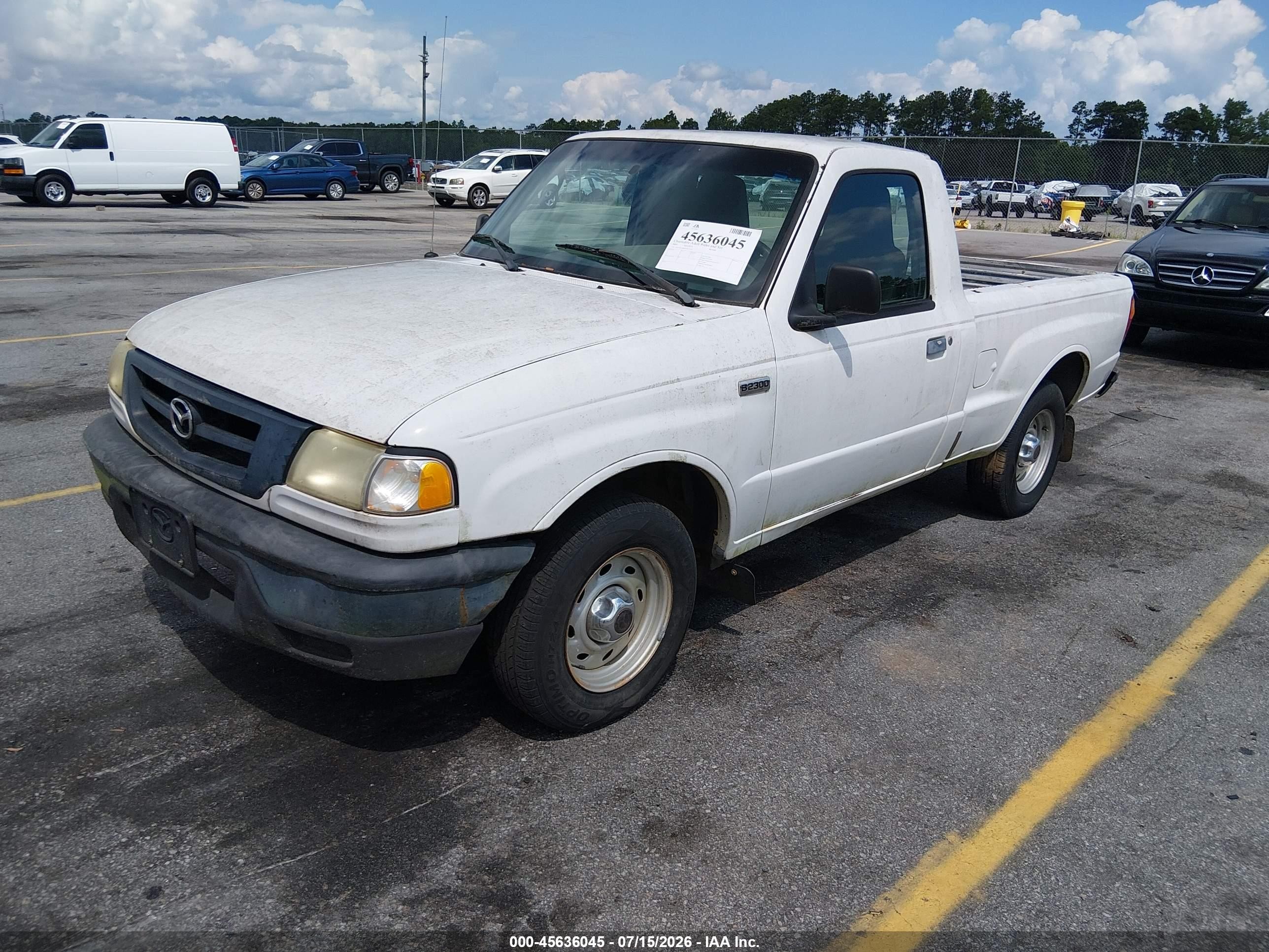 2004 Mazda B2300   White vin: 4F4YR12D04TM11215