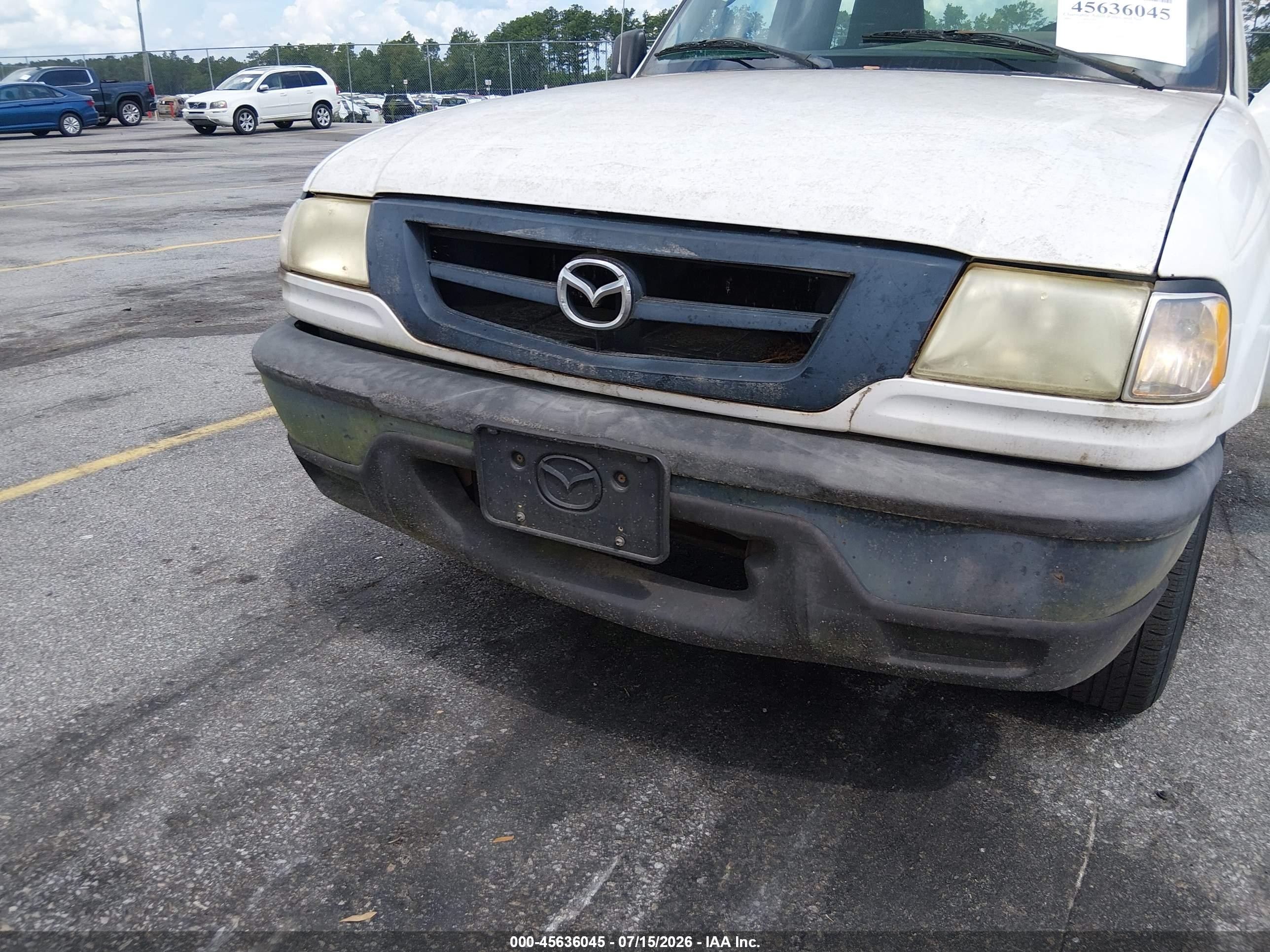 2004 Mazda B2300   White vin: 4F4YR12D04TM11215