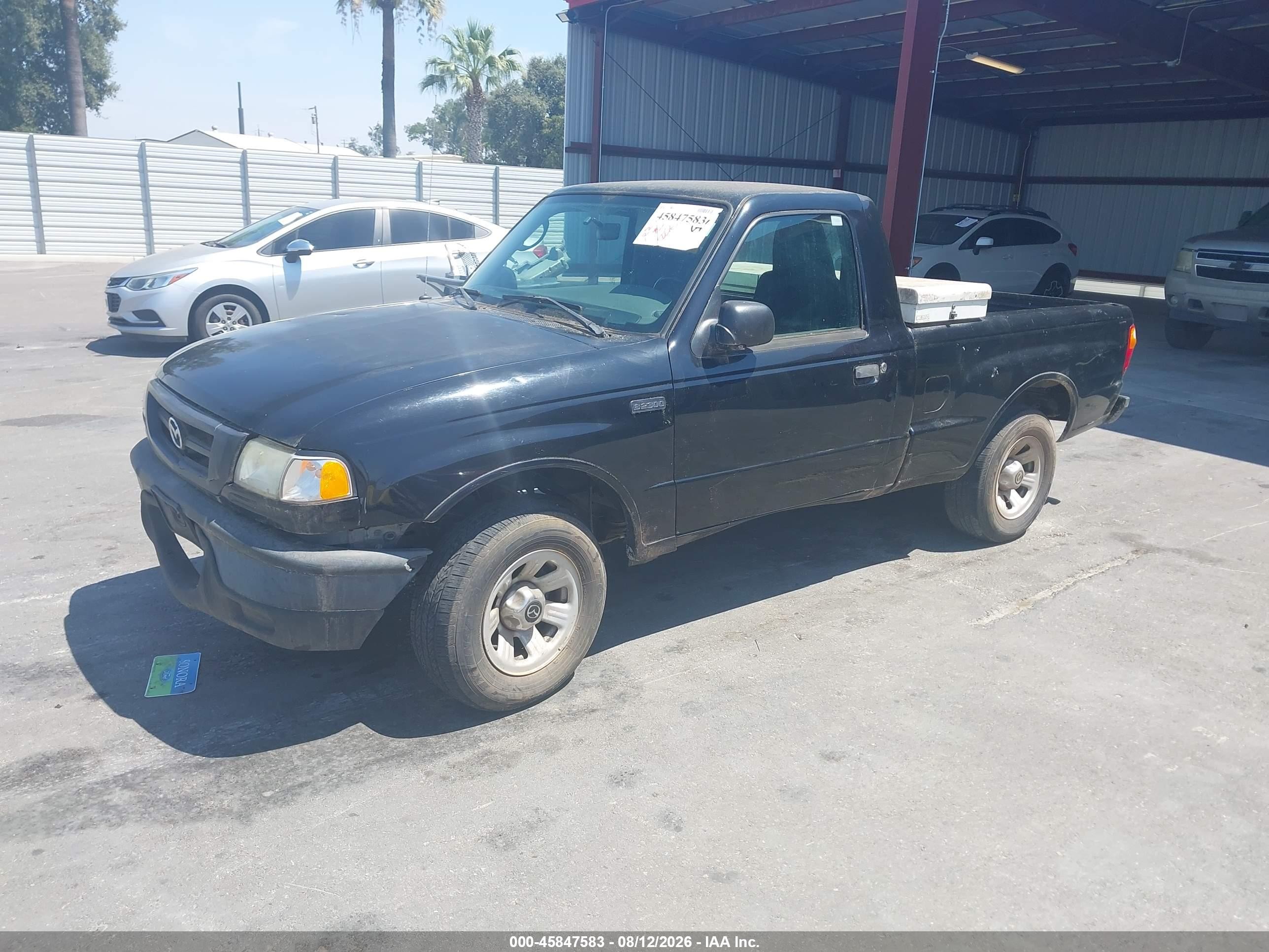 2004 Mazda B2300   Black vin: 4F4YR12D24TM11197