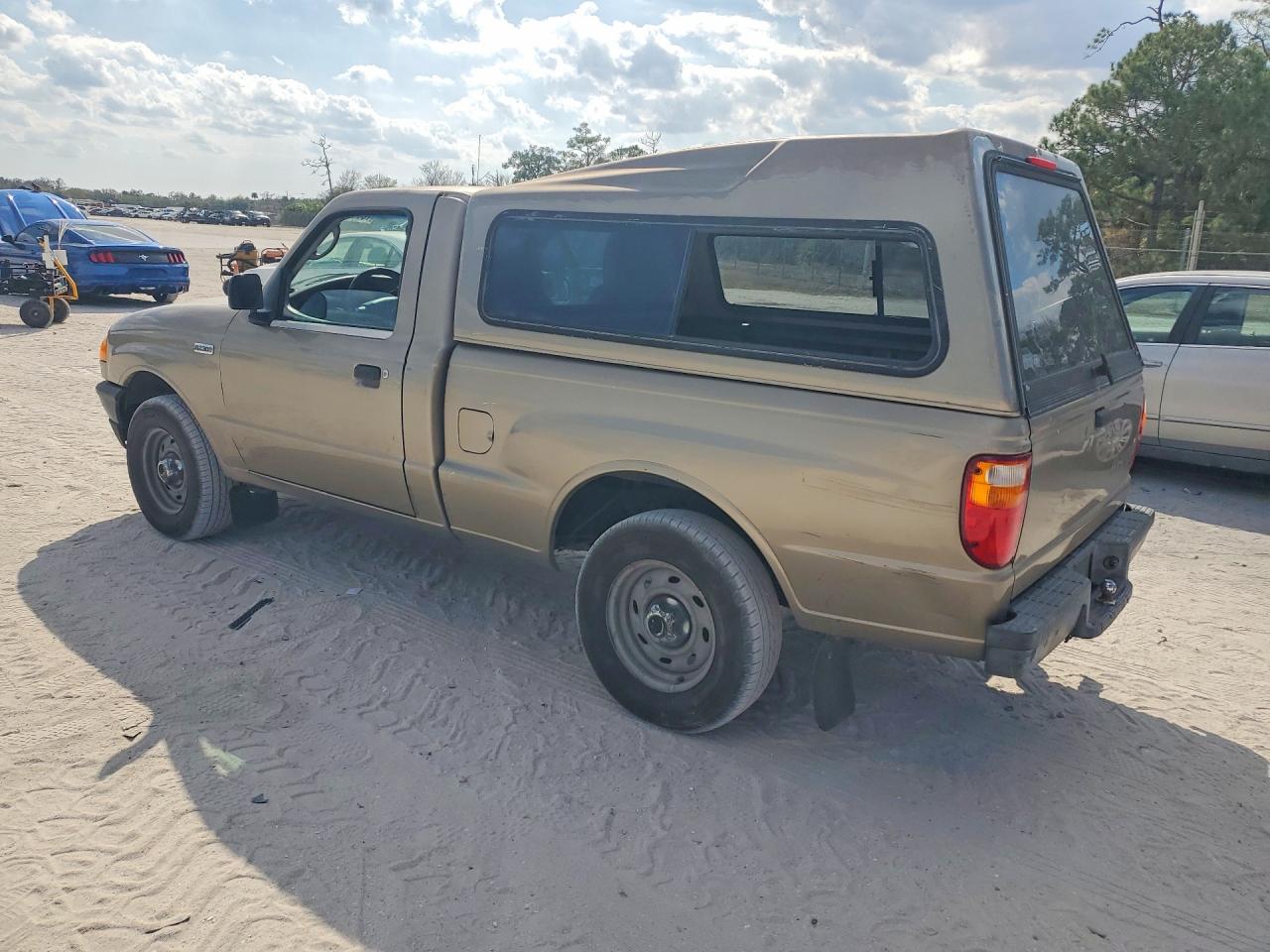 2004 Mazda B2300 Tan vin: 4F4YR12D44TM03859