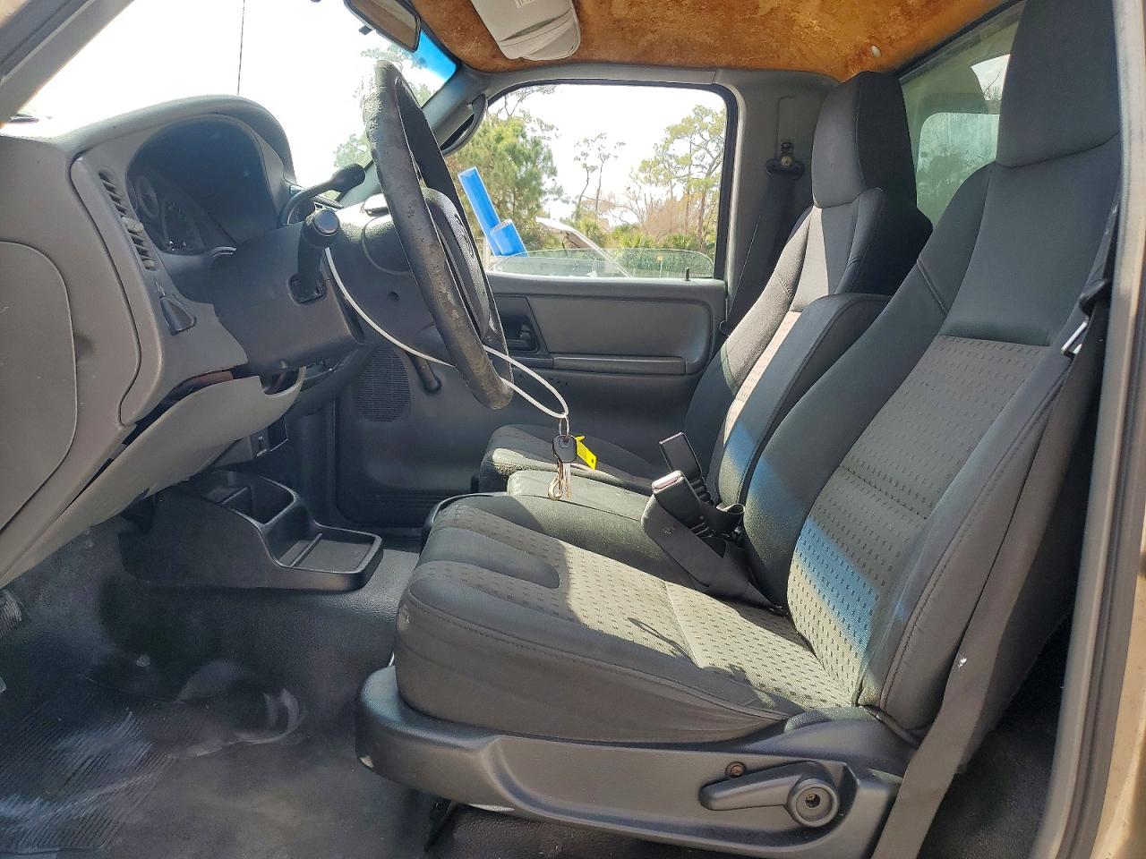 2004 Mazda B2300 Tan vin: 4F4YR12D44TM03859