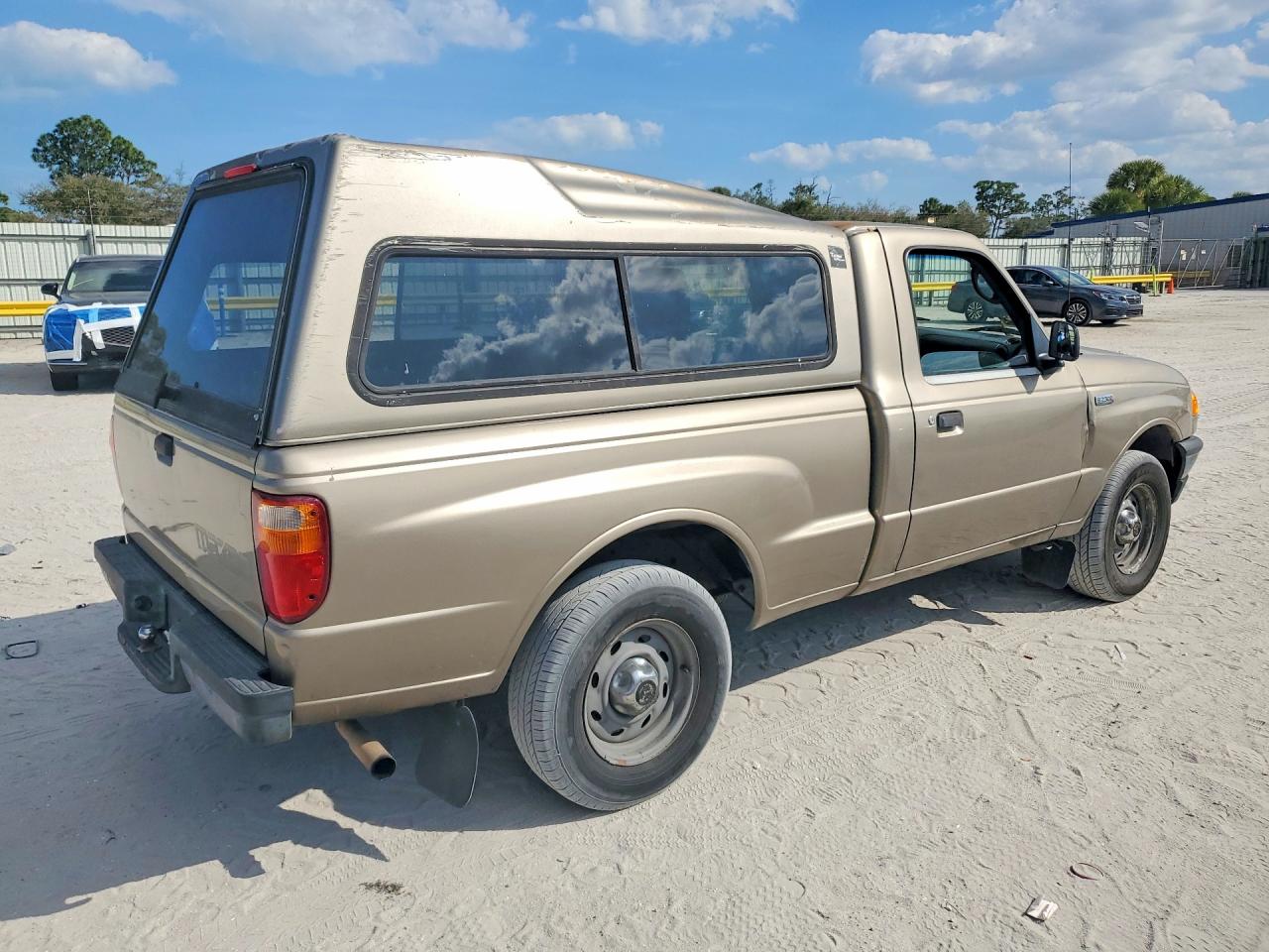 2004 Mazda B2300 Tan vin: 4F4YR12D44TM03859