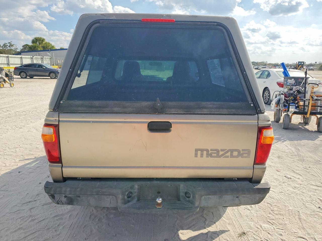 2004 Mazda B2300 Tan vin: 4F4YR12D44TM03859
