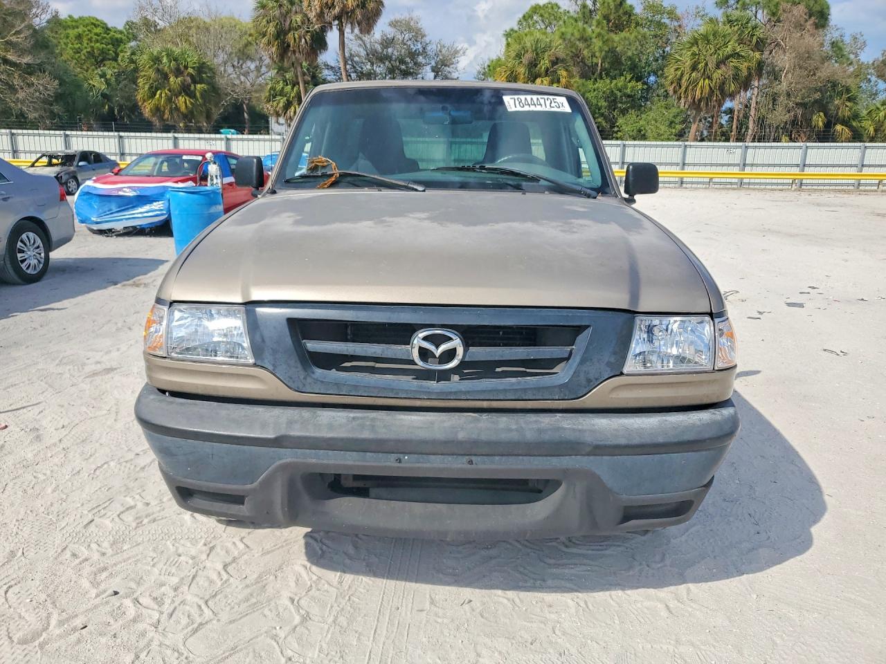 2004 Mazda B2300 Tan vin: 4F4YR12D44TM03859