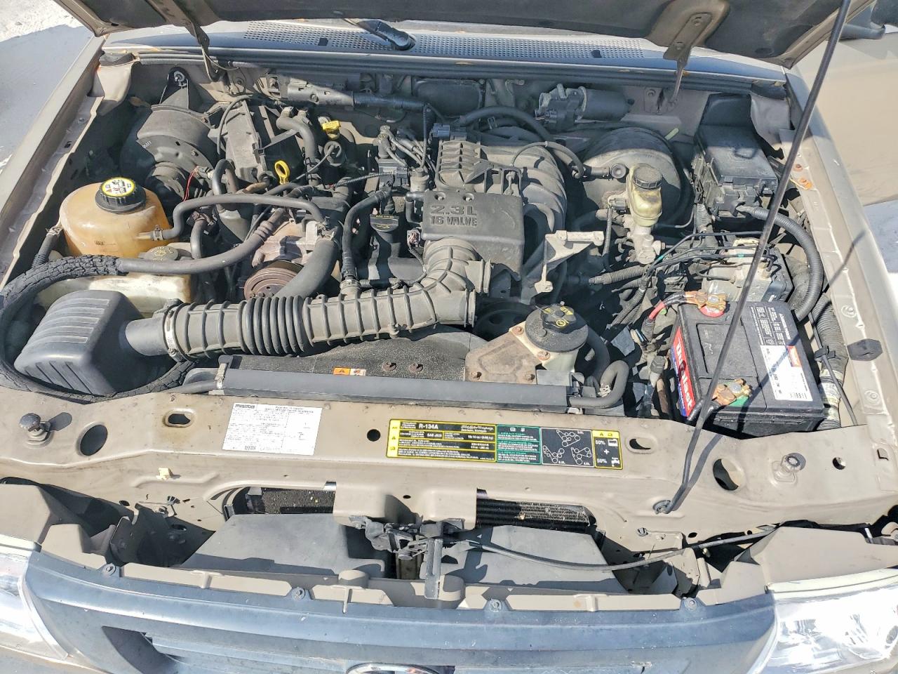 2004 Mazda B2300 Tan vin: 4F4YR12D44TM03859
