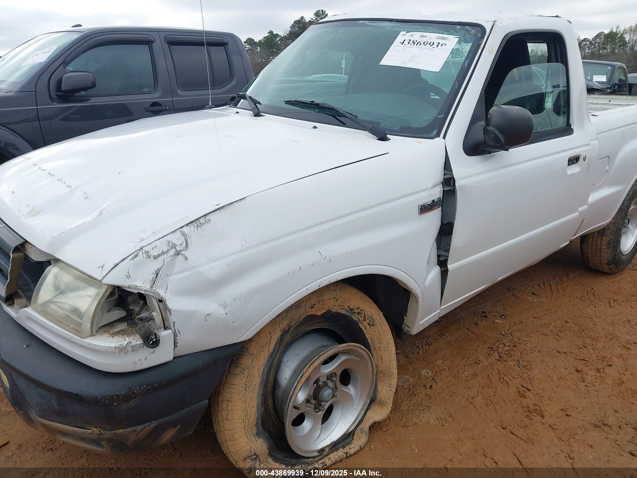 2004 Mazda B2300   White vin: 4F4YR12DX4TM04384
