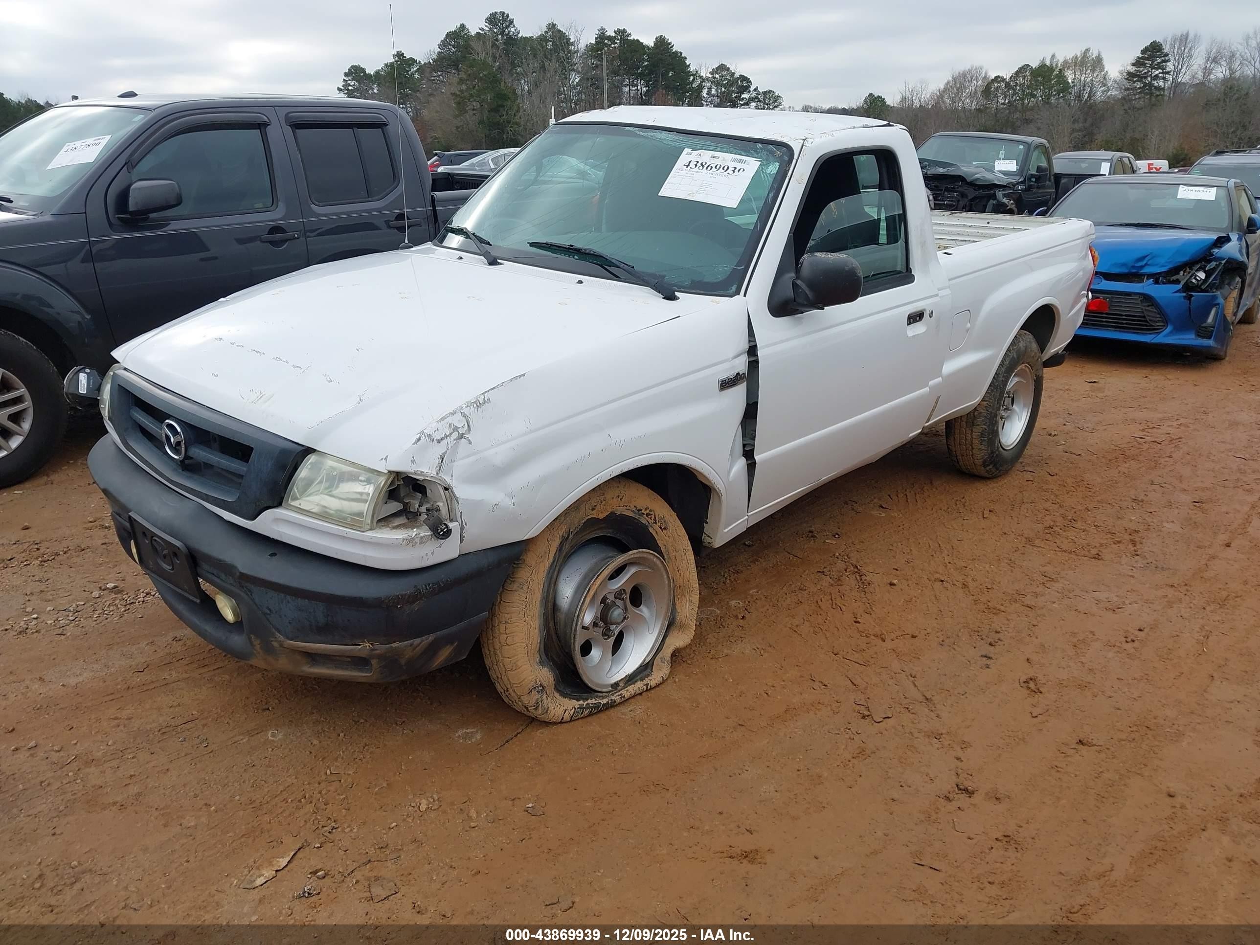 2004 Mazda B2300   White vin: 4F4YR12DX4TM04384
