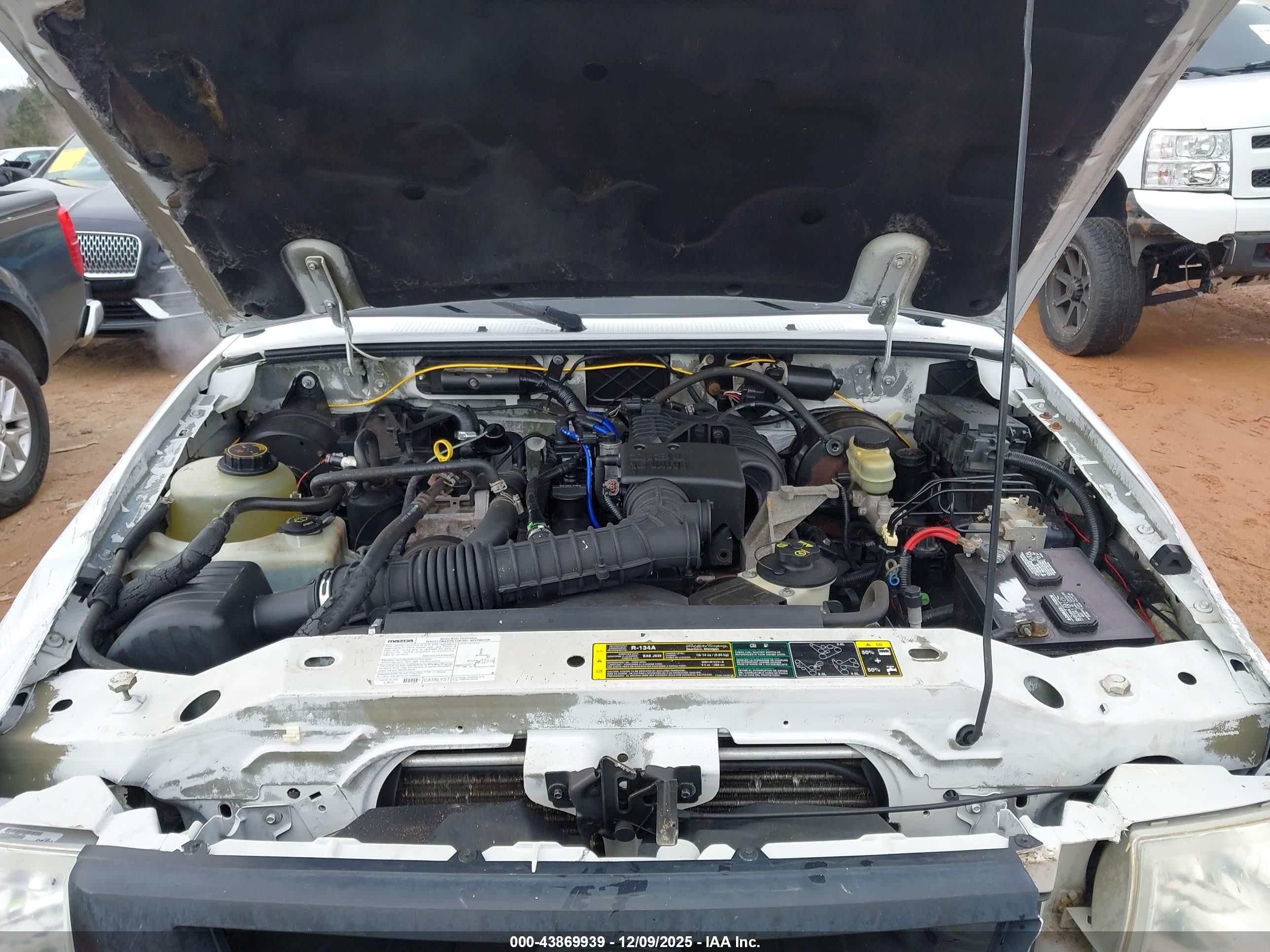 2004 Mazda B2300   White vin: 4F4YR12DX4TM04384